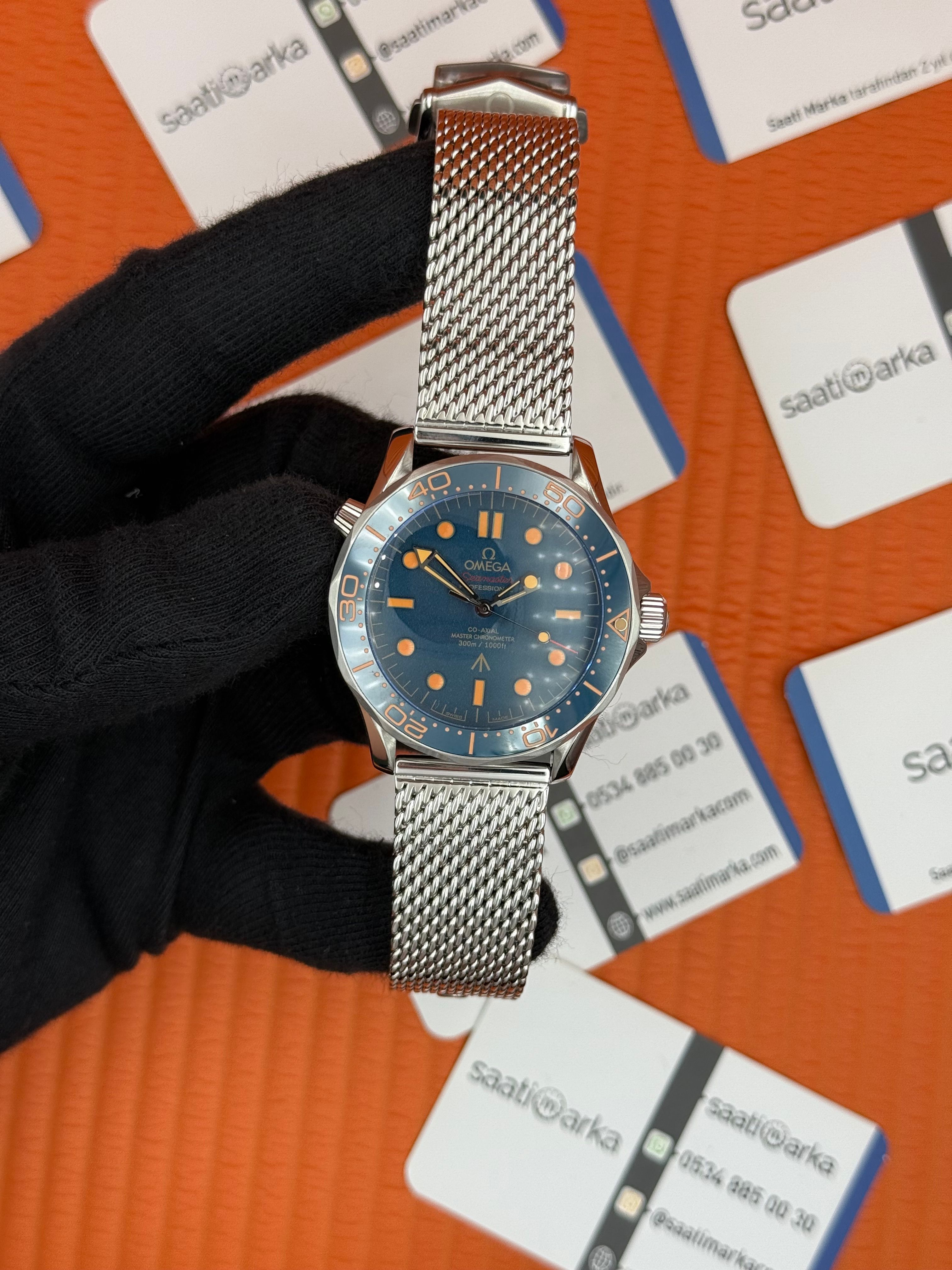 OMEGA JAMES NOND 300M HASIR KORDON ROSE DETAYLI
