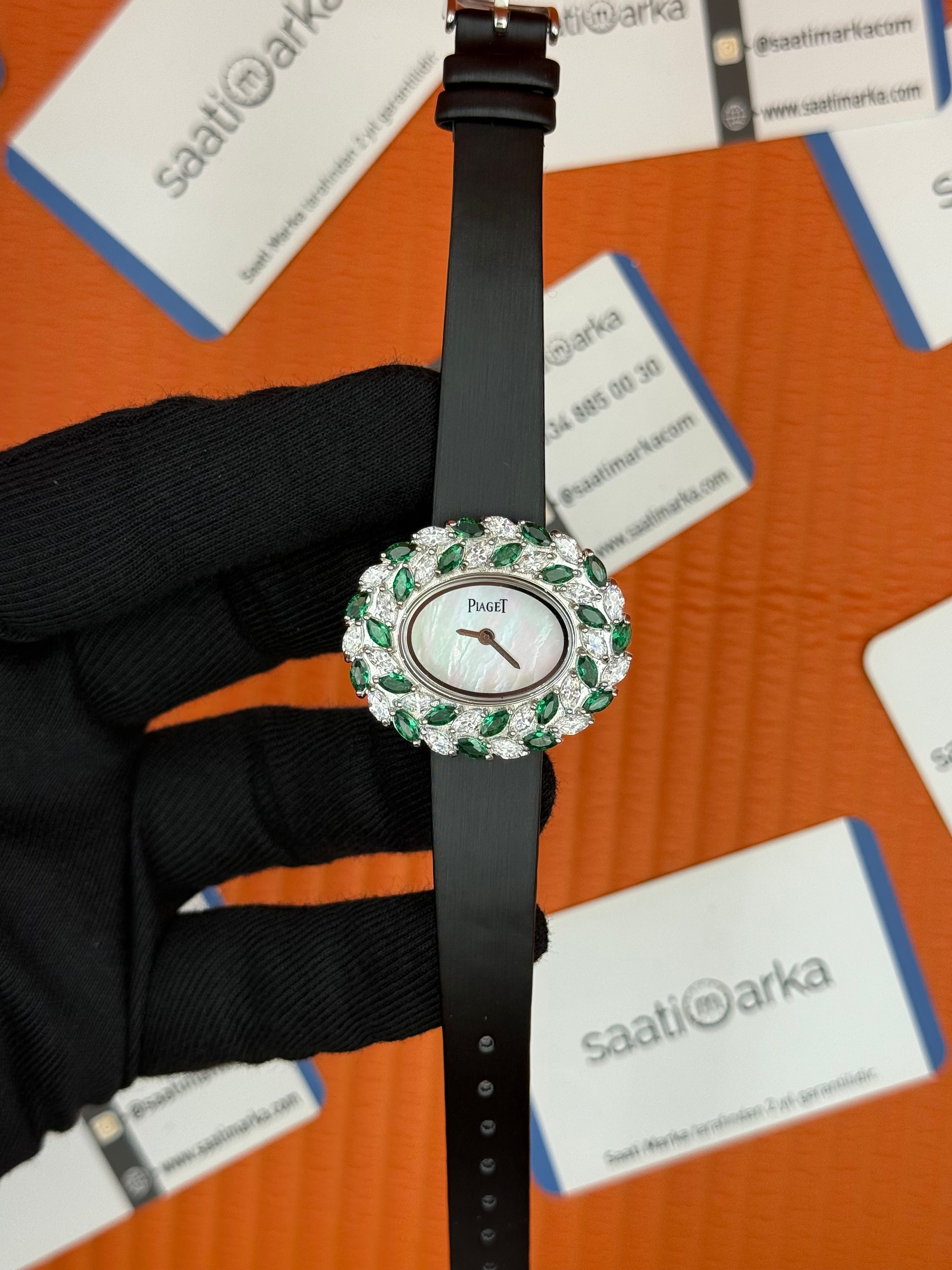 PIAGET taşlı bezel sedef kadran deri siyah kordon