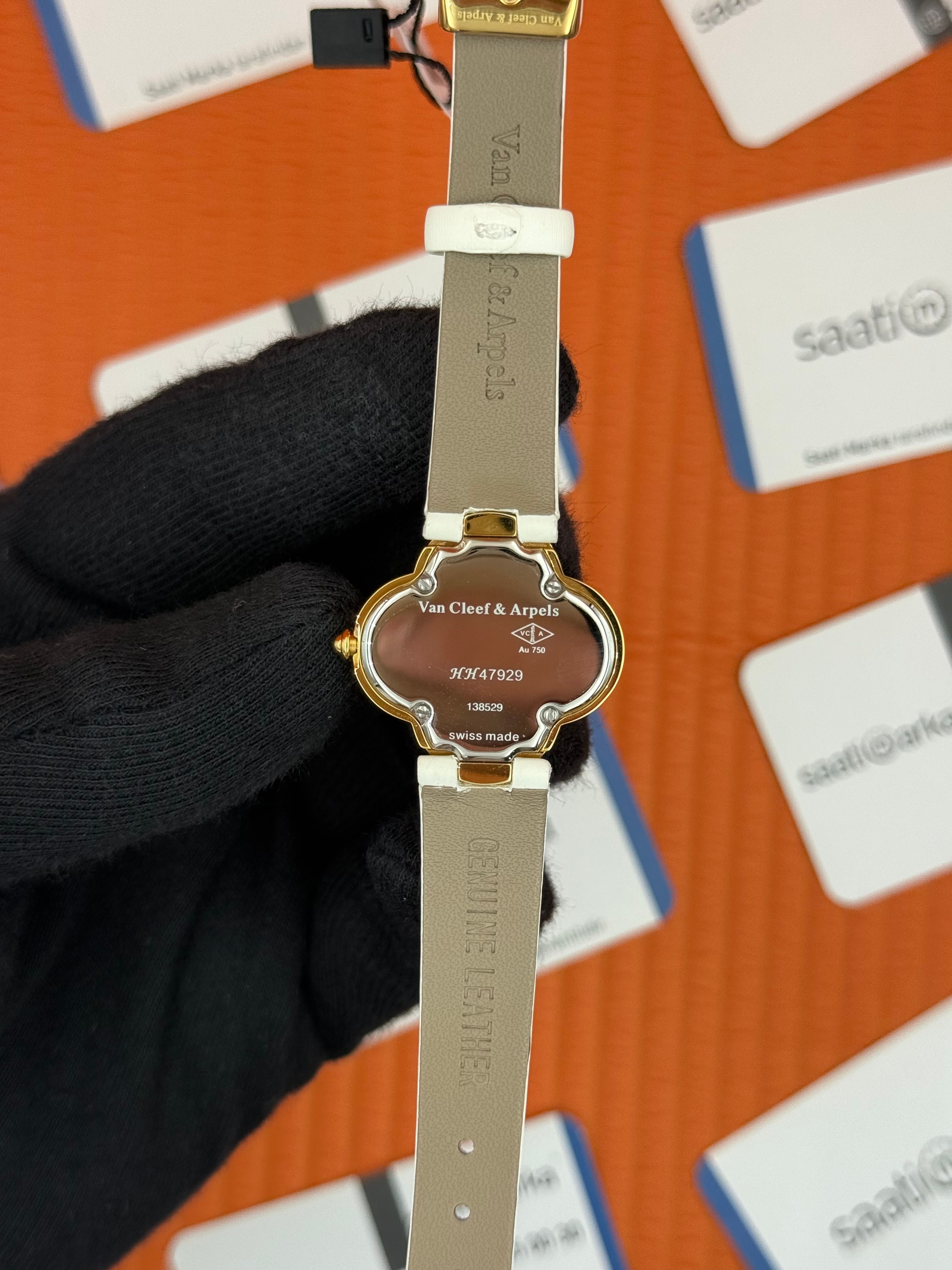 VAN CLEEF beyaz kadran beyaz deri kordon gold kasa bezel kadın kol saati