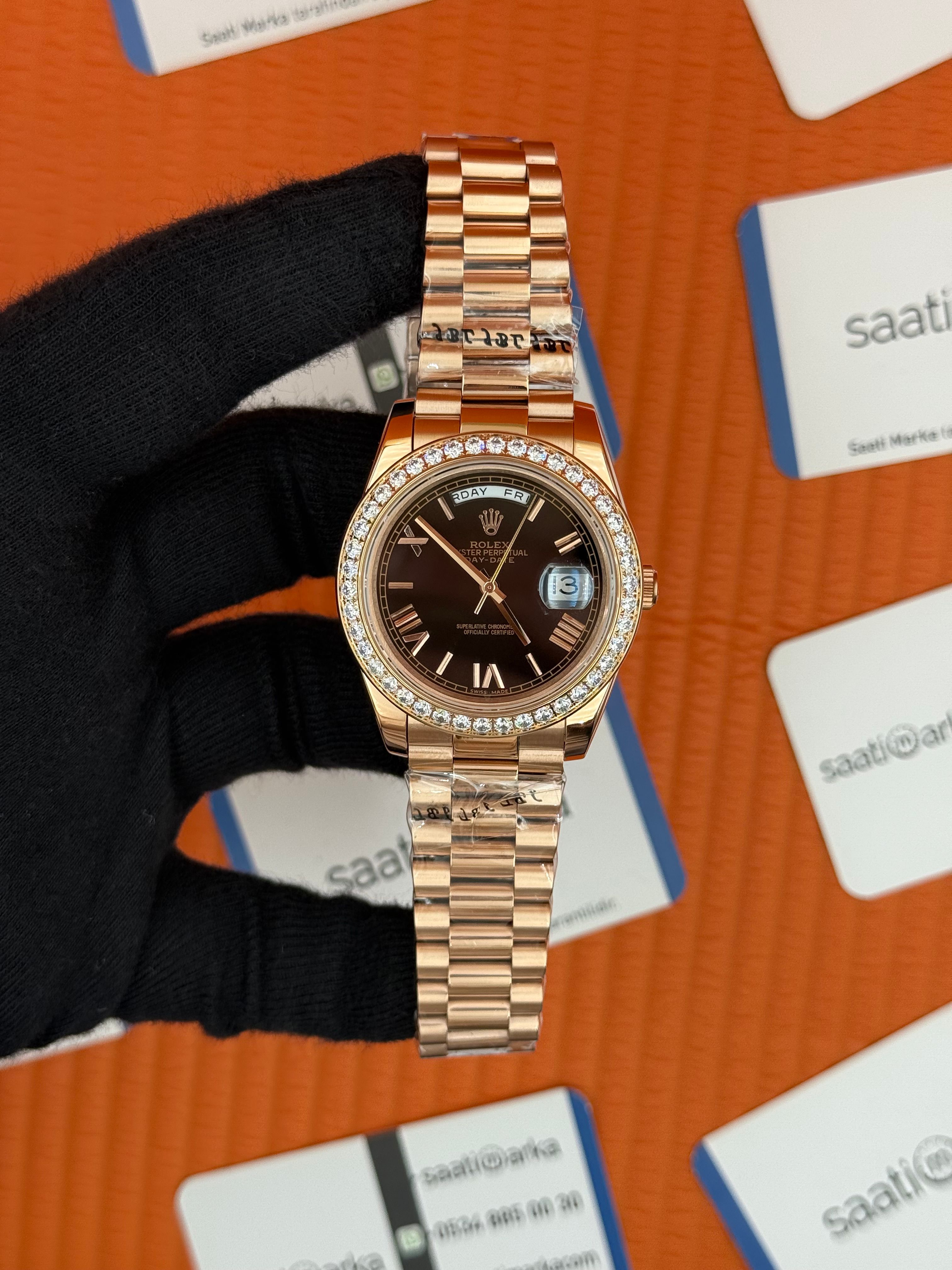 ROLEX Day Date taşlı bezel roma rakamlı siyah kadran rose kasa-kordon oyster