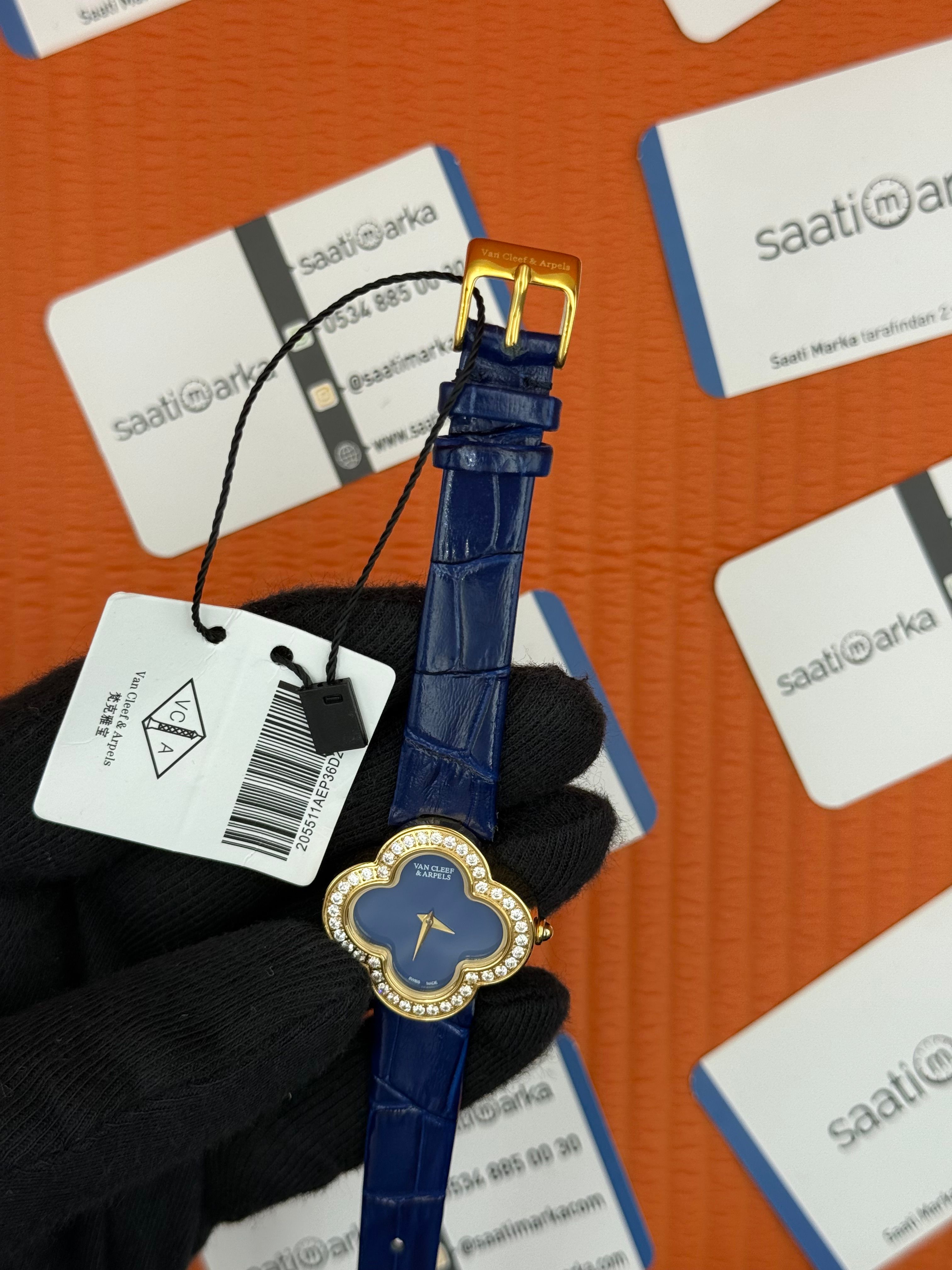 VAN CLEEF lacivert kadran lacivert deri kordon gold kasa taşlı bezel kadın kol saati