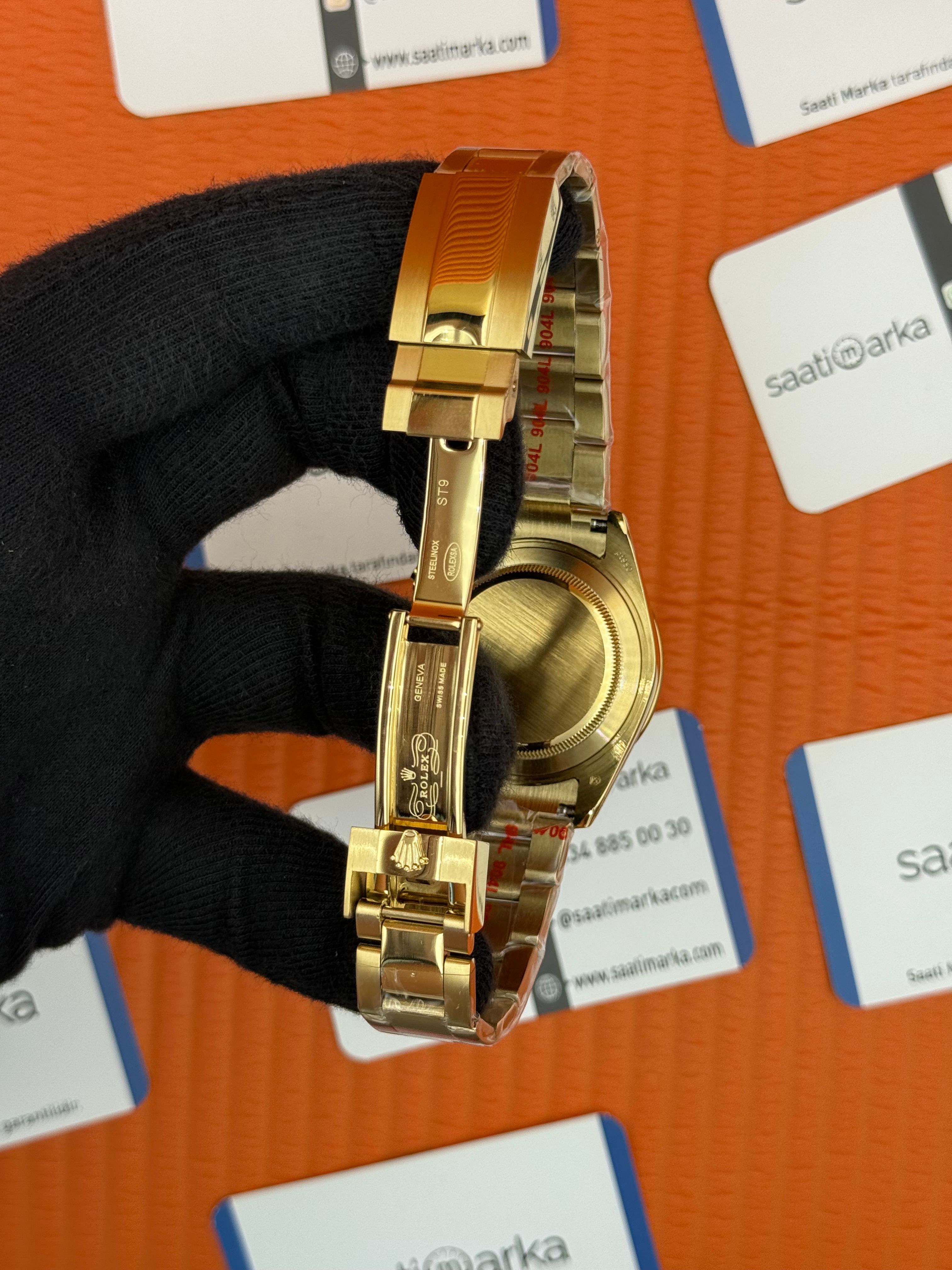 ROLEX Daytona taşlı bezel champagne dial gold kasa-kordon