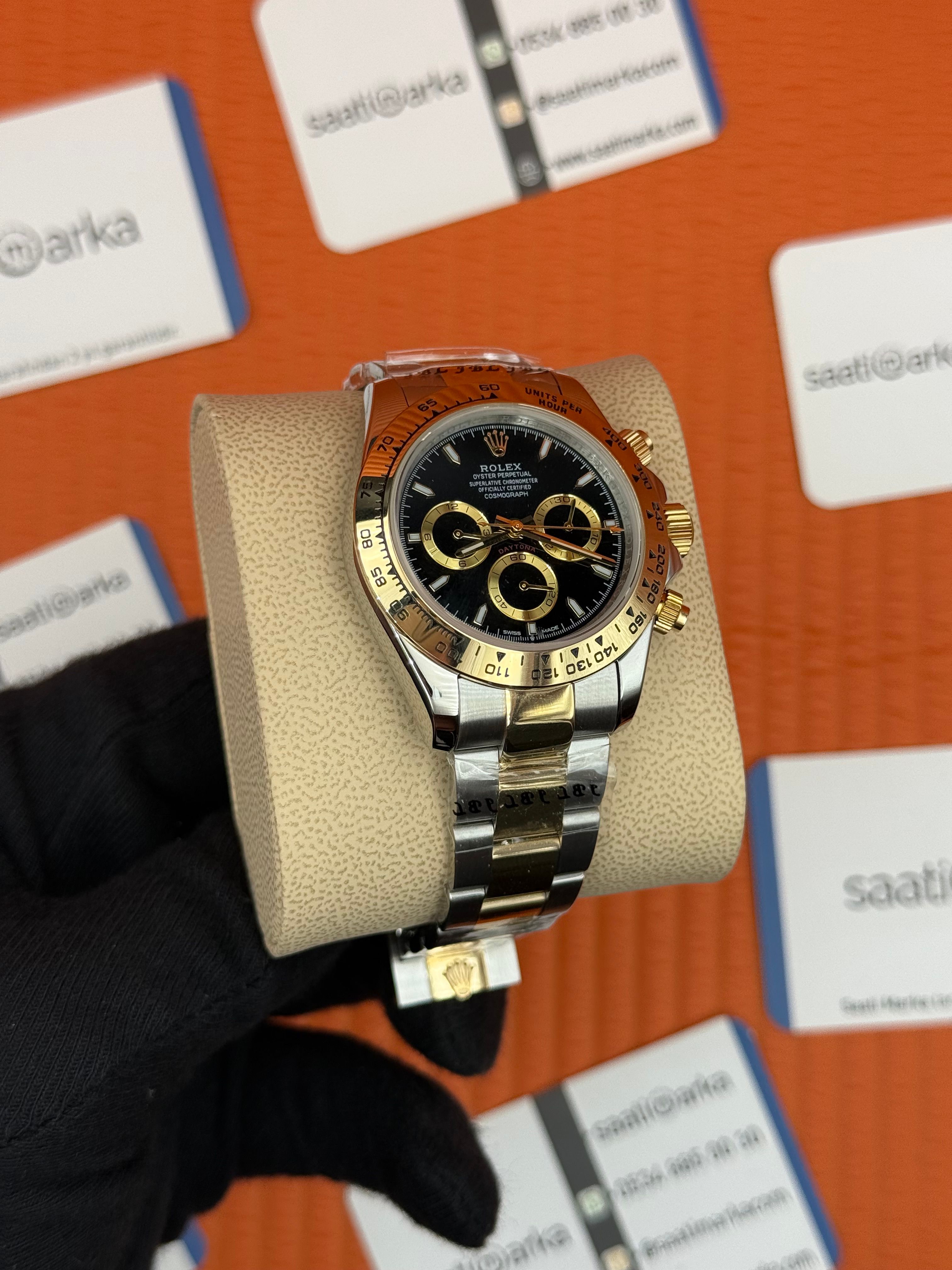 ROLEX Daytona black dial gold silver kasa-kordon