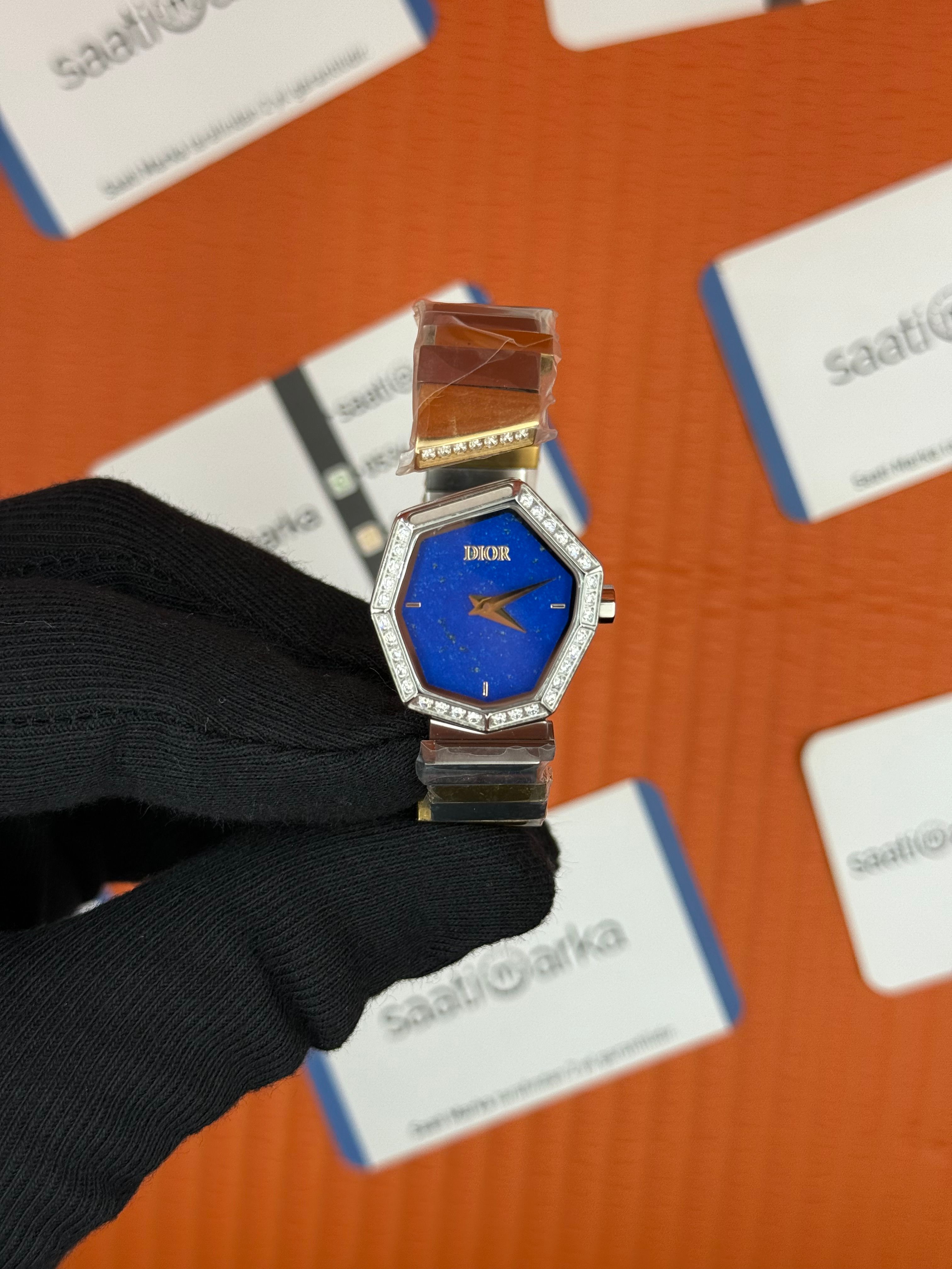 DİOR taşlı bezel mavi kadran gold silver kordon kadın kol saati