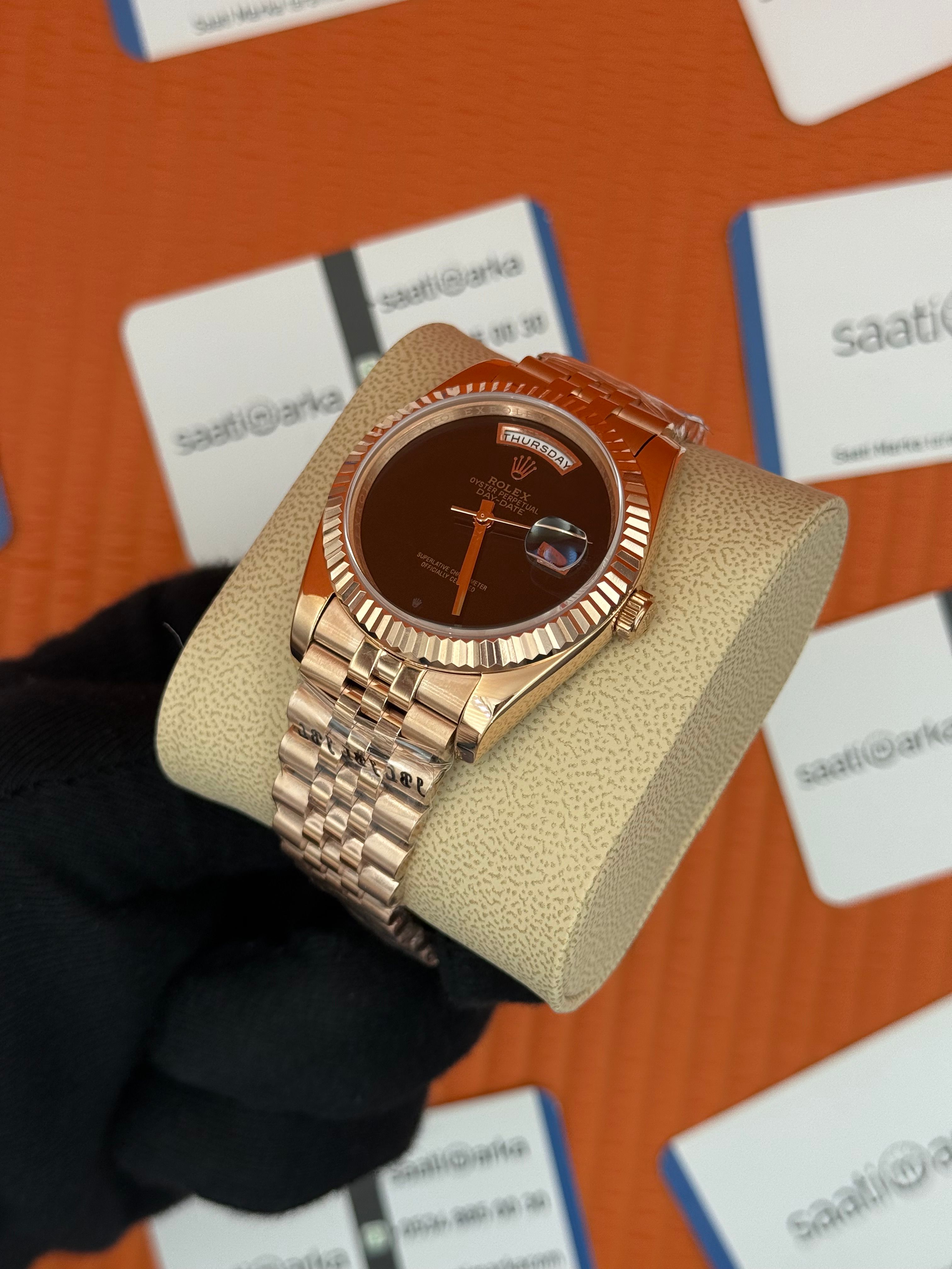 ROLEX Day Date siyah kadran rose kasa-kordon jubilee