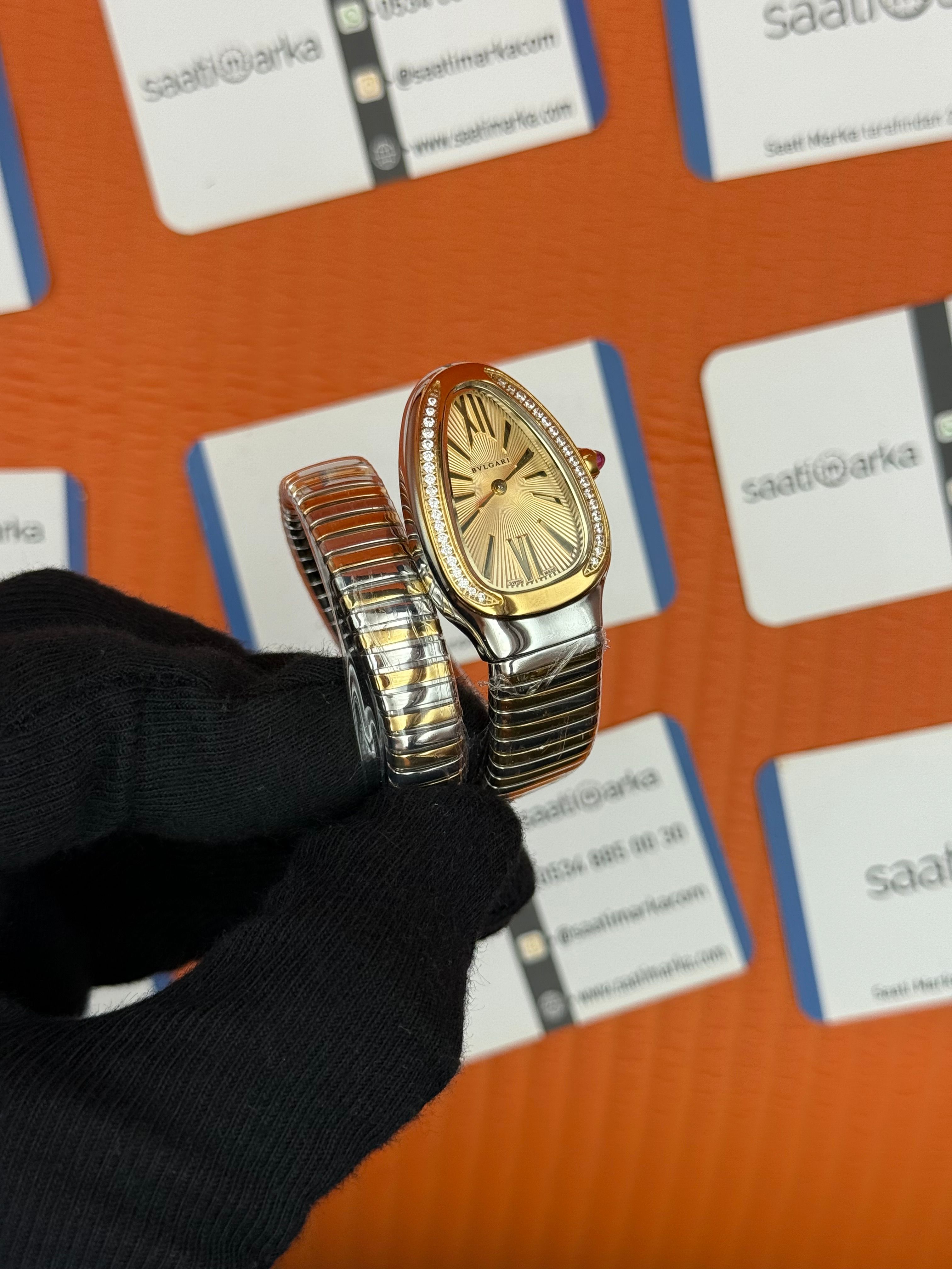 BVLGARİ serpenti tek sarma gold silver kordon taşlı bezel şampanya kadran kadın kol saati