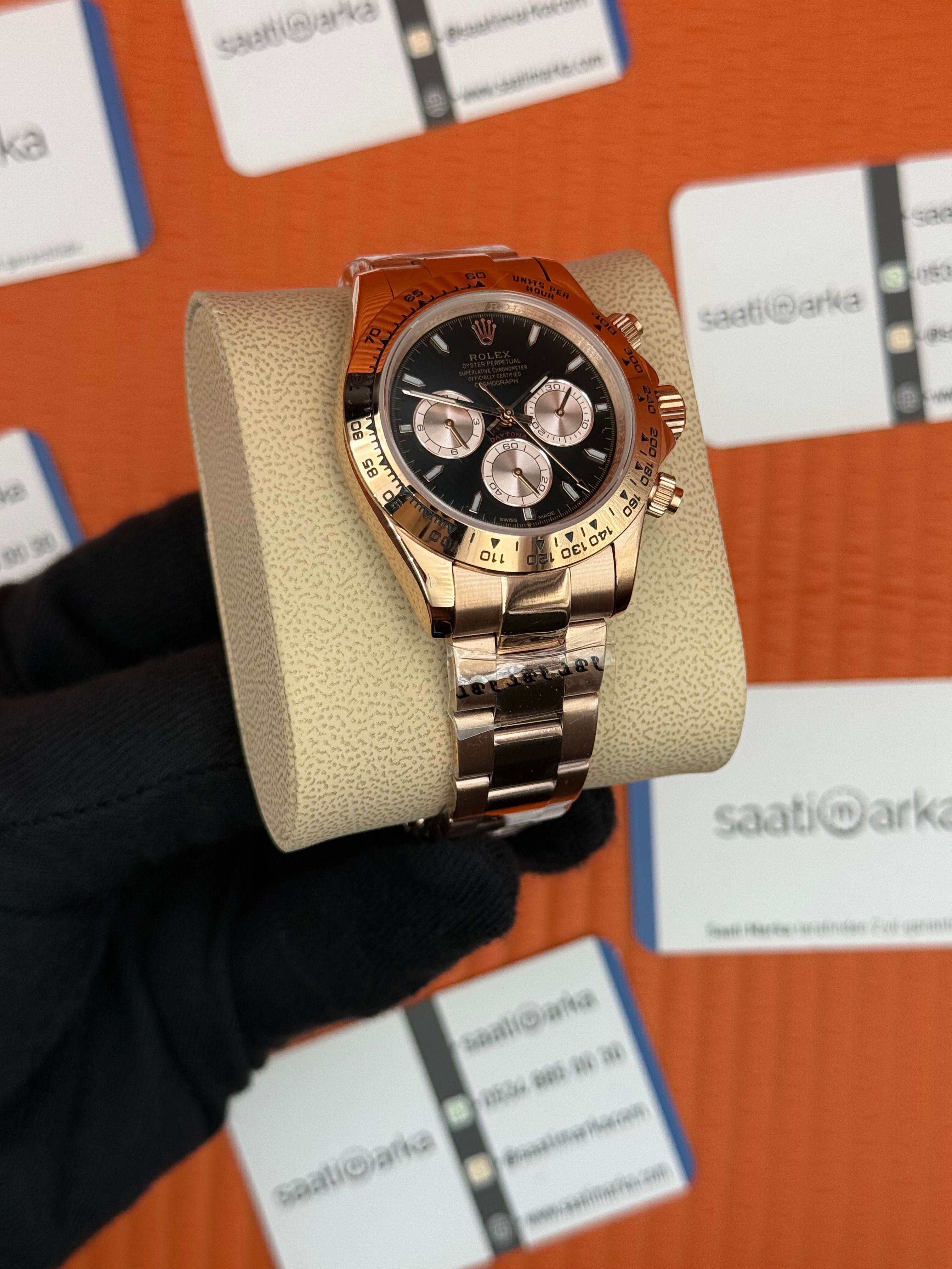ROLEX Daytona black dial rose kasa-kordon