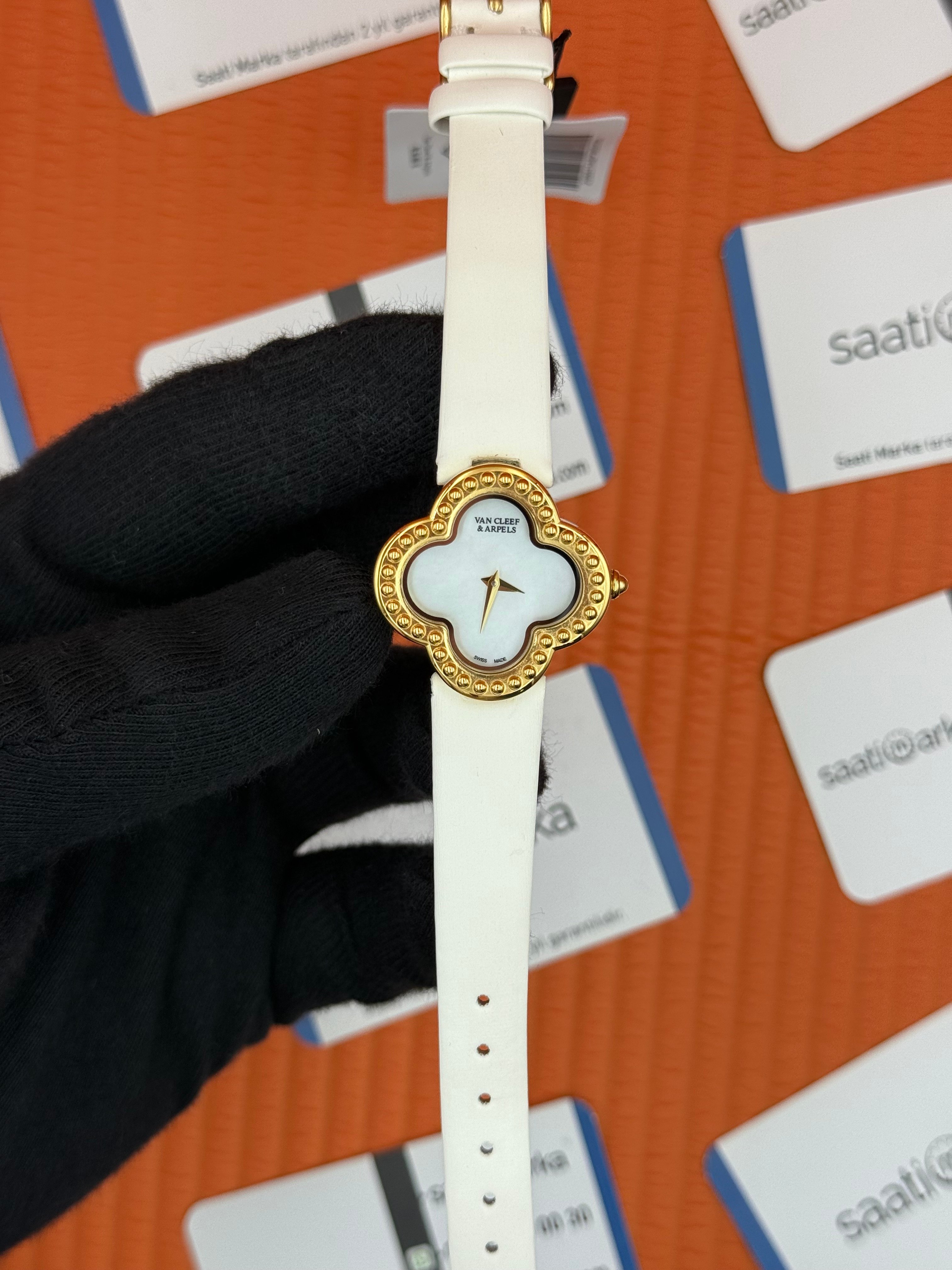VAN CLEEF beyaz kadran beyaz deri kordon gold kasa bezel kadın kol saati