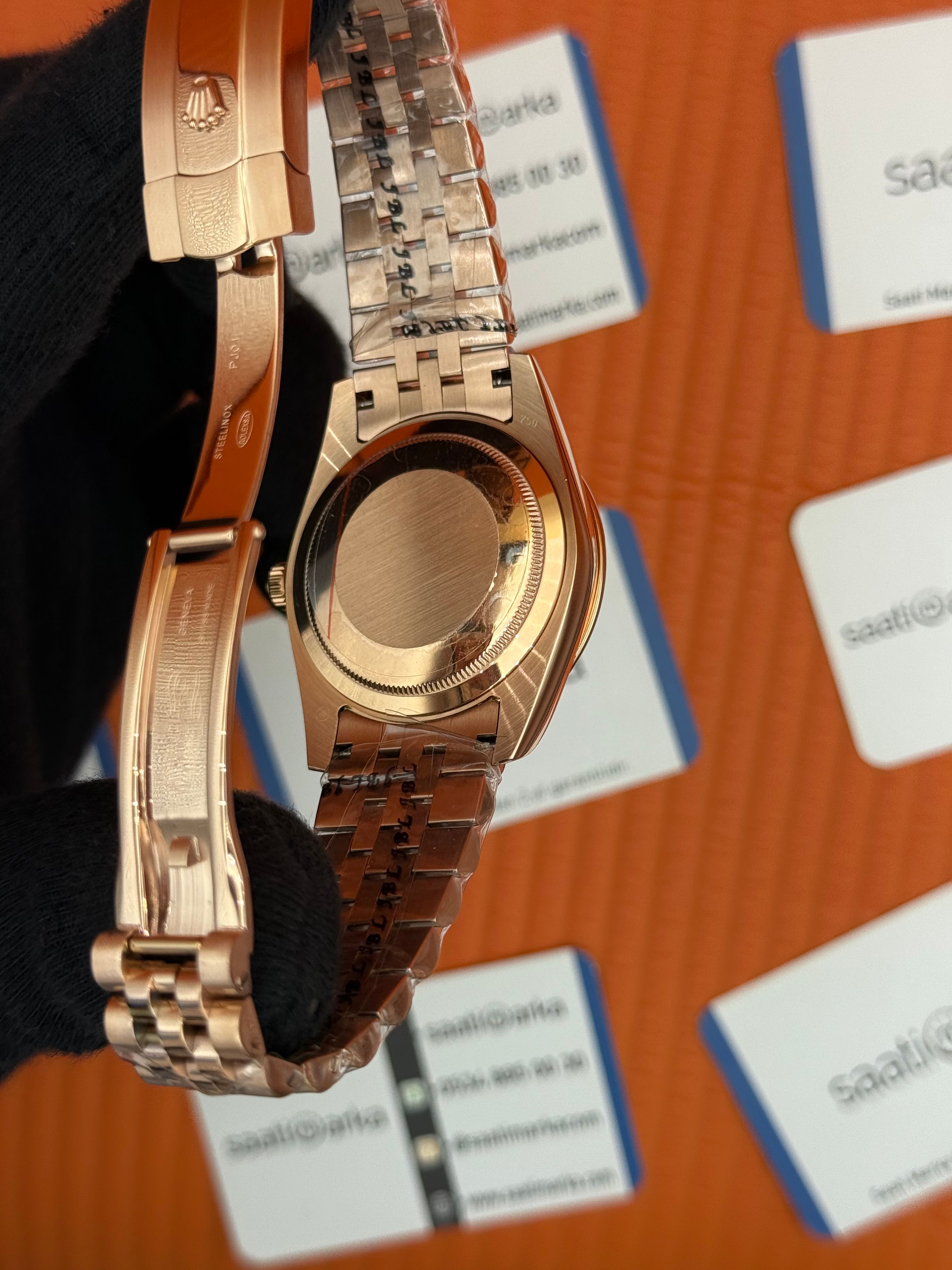 ROLEX Day Date taşlı bezel roma rakamlı rose kadran rose kasa-kordon jubilee