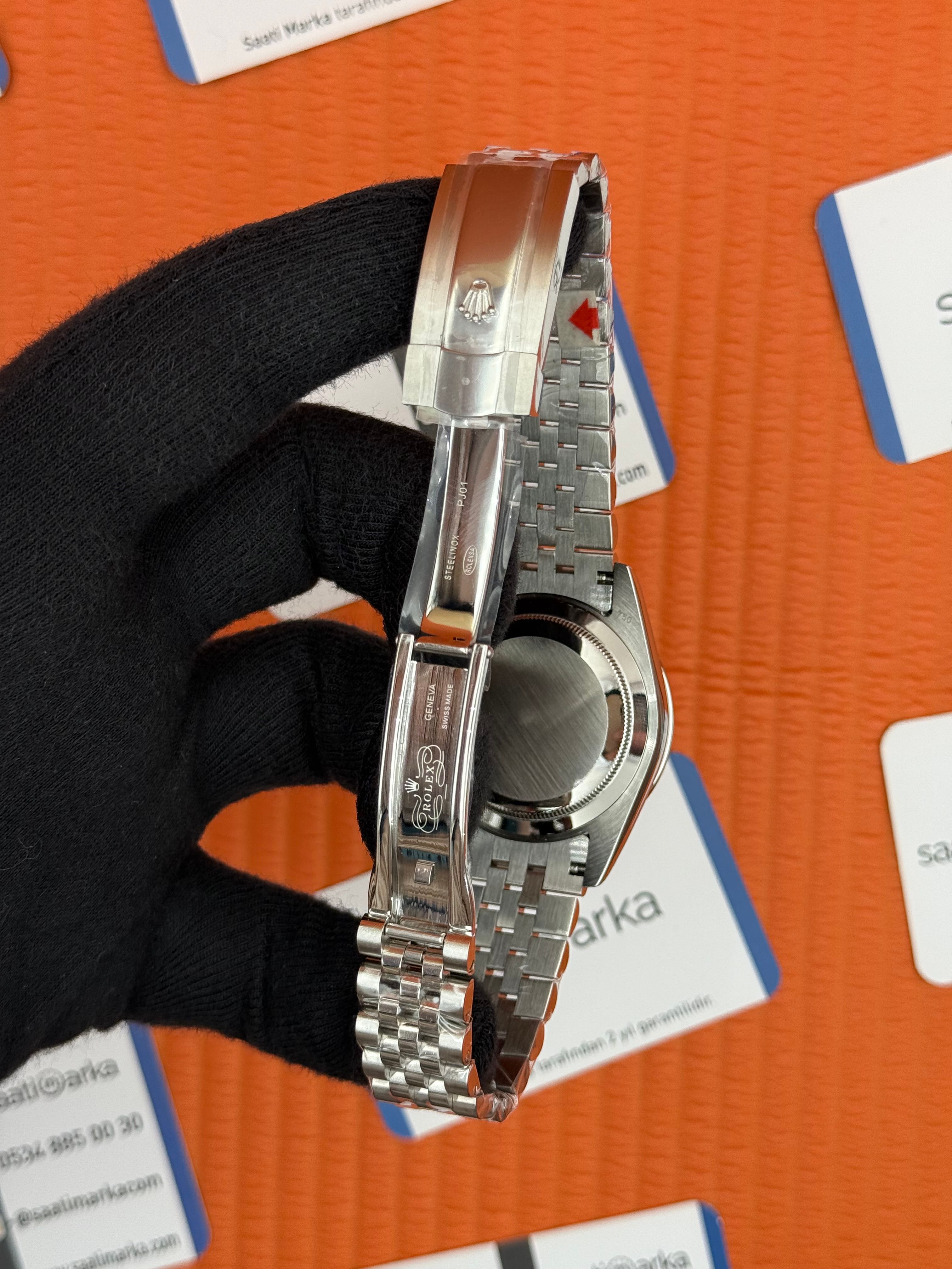 ROLEX  Datejust taşlı bezel baget taşlı blue dial silver jublee kordon