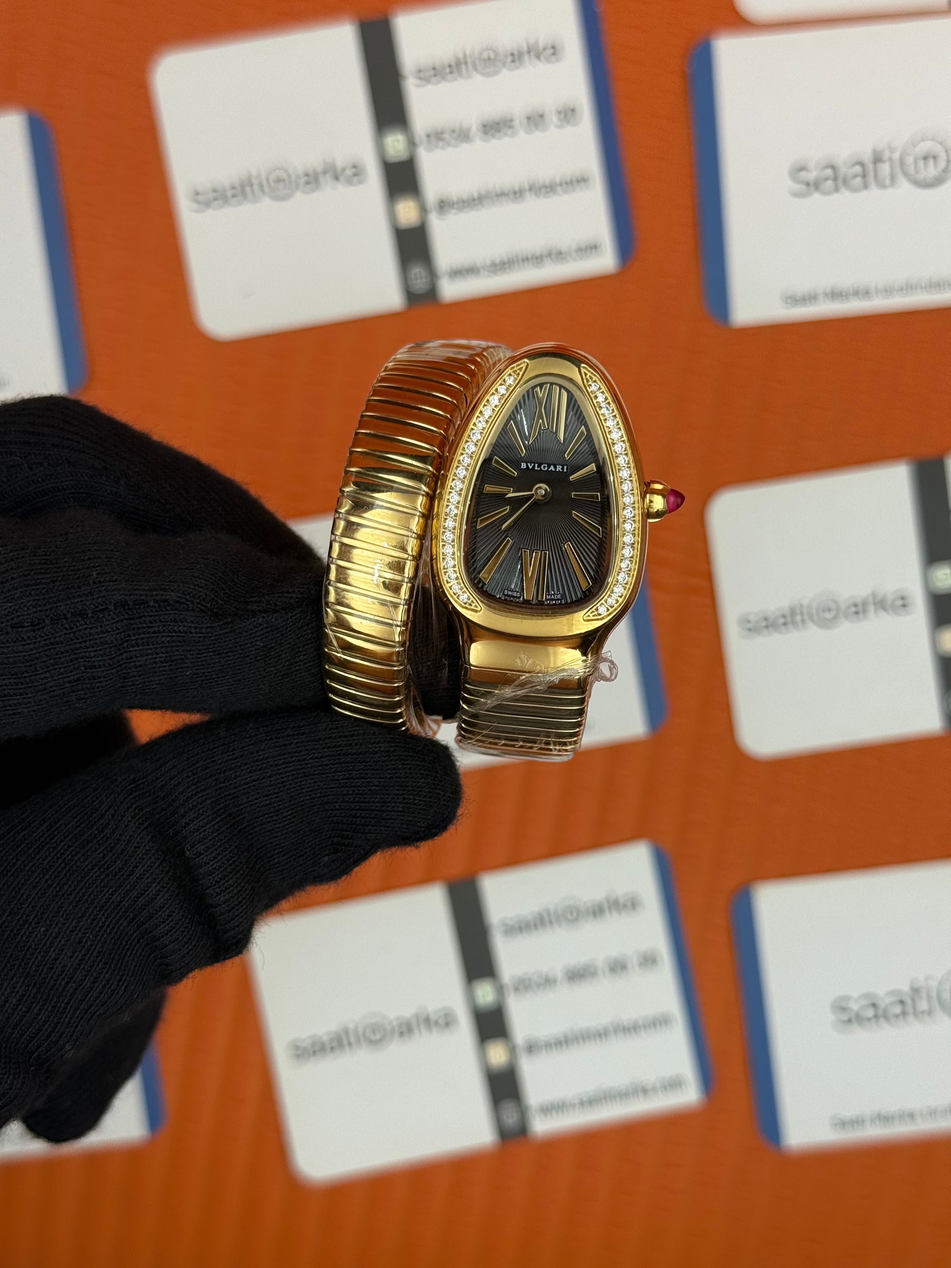 BVLGARİ serpenti tek sarma gold kordon taşlı bezel siyah kadran kadın kol saati