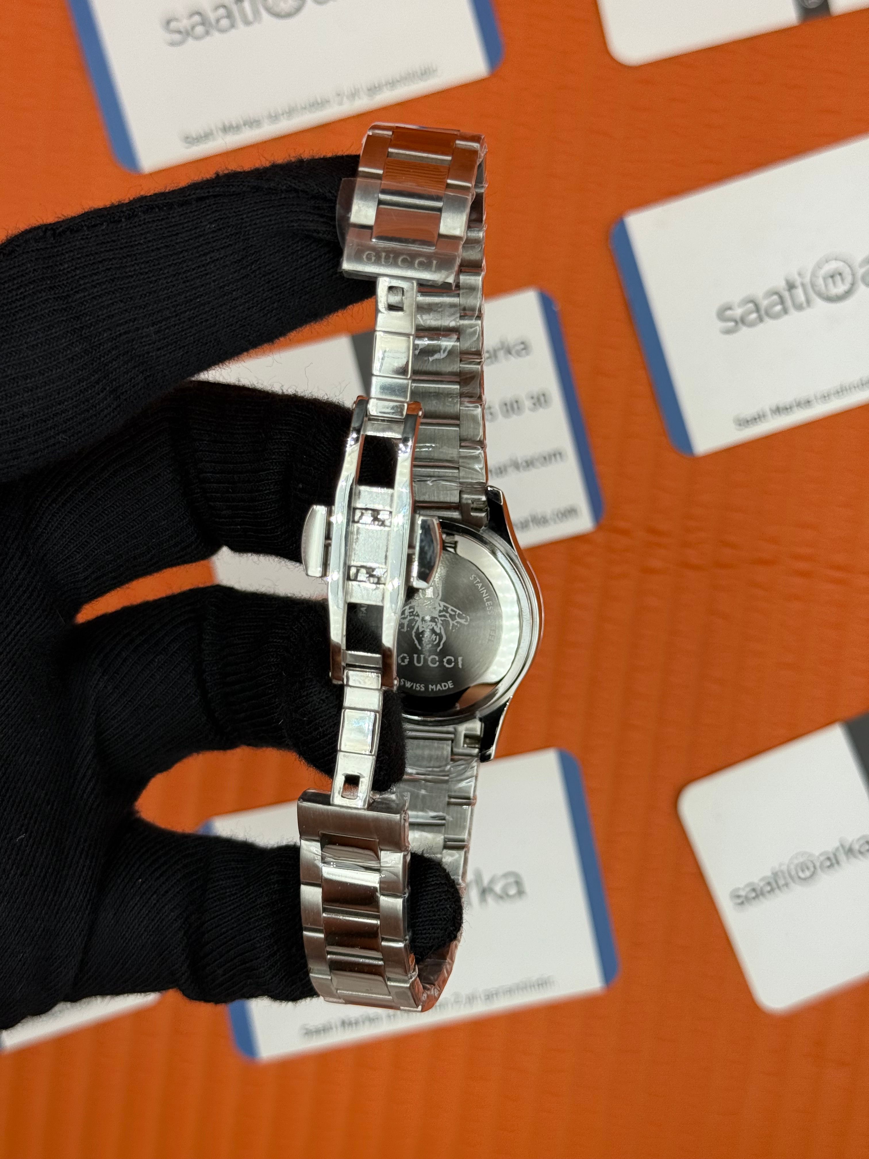 GUCCI YA1265031 beyaz kadran silver kasa kordon kadın kol saati