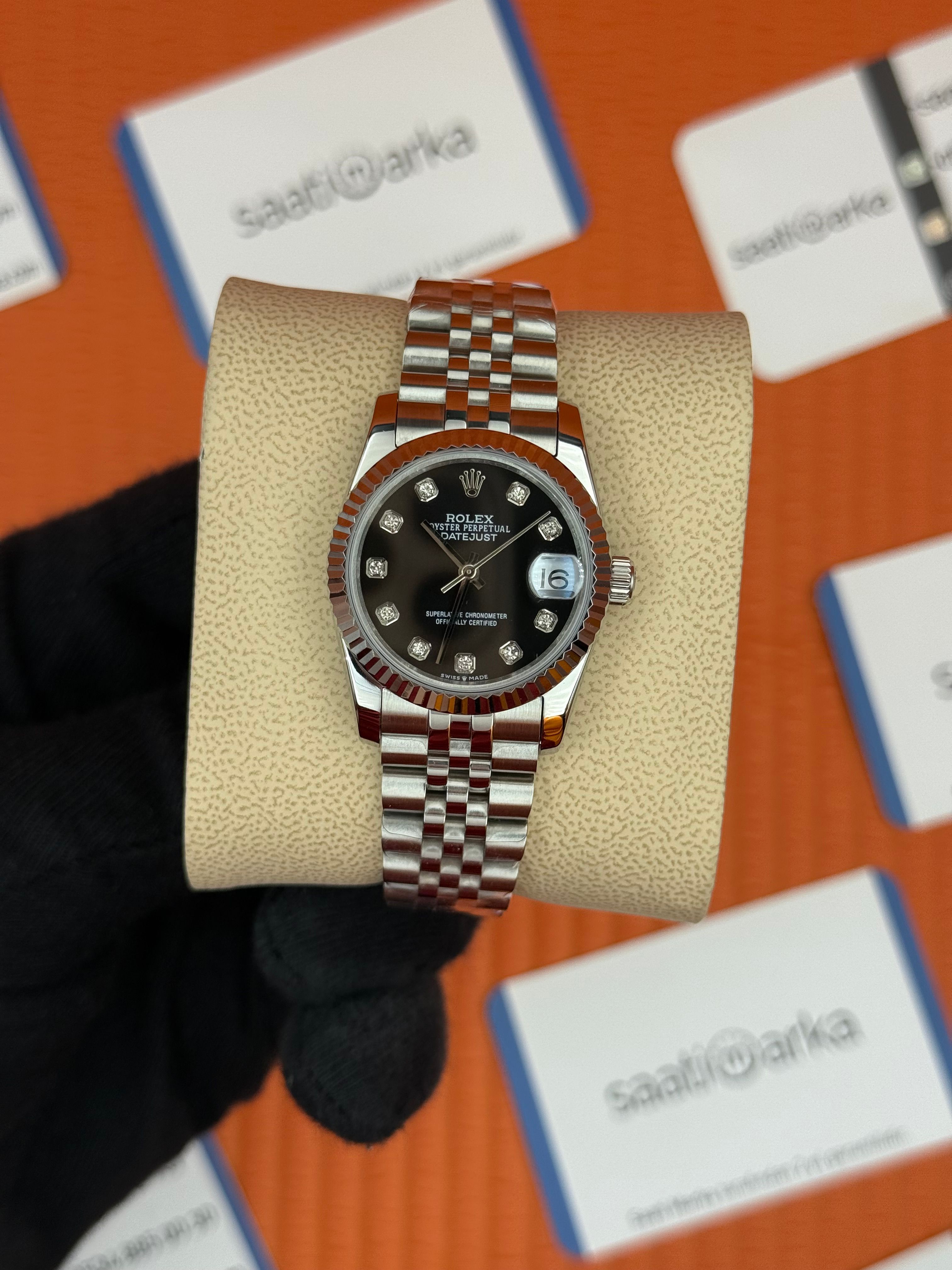 ROLEX datejust 31mm siyah baget taşlı kadran silver jubilee kordon