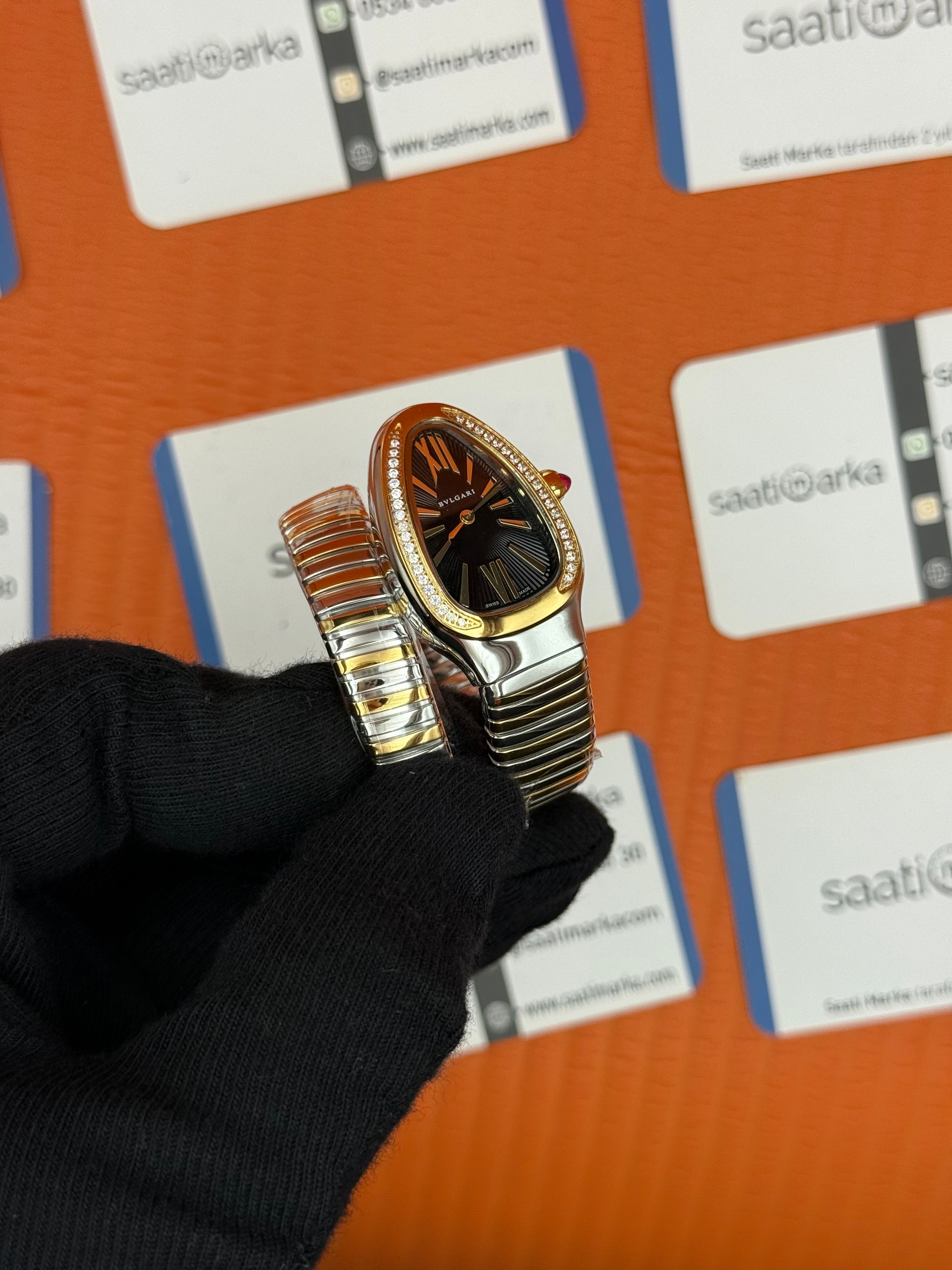 BVLGARİ serpenti tek sarma gold silver kordon taşlı bezel siyah kadran kadın kol saati