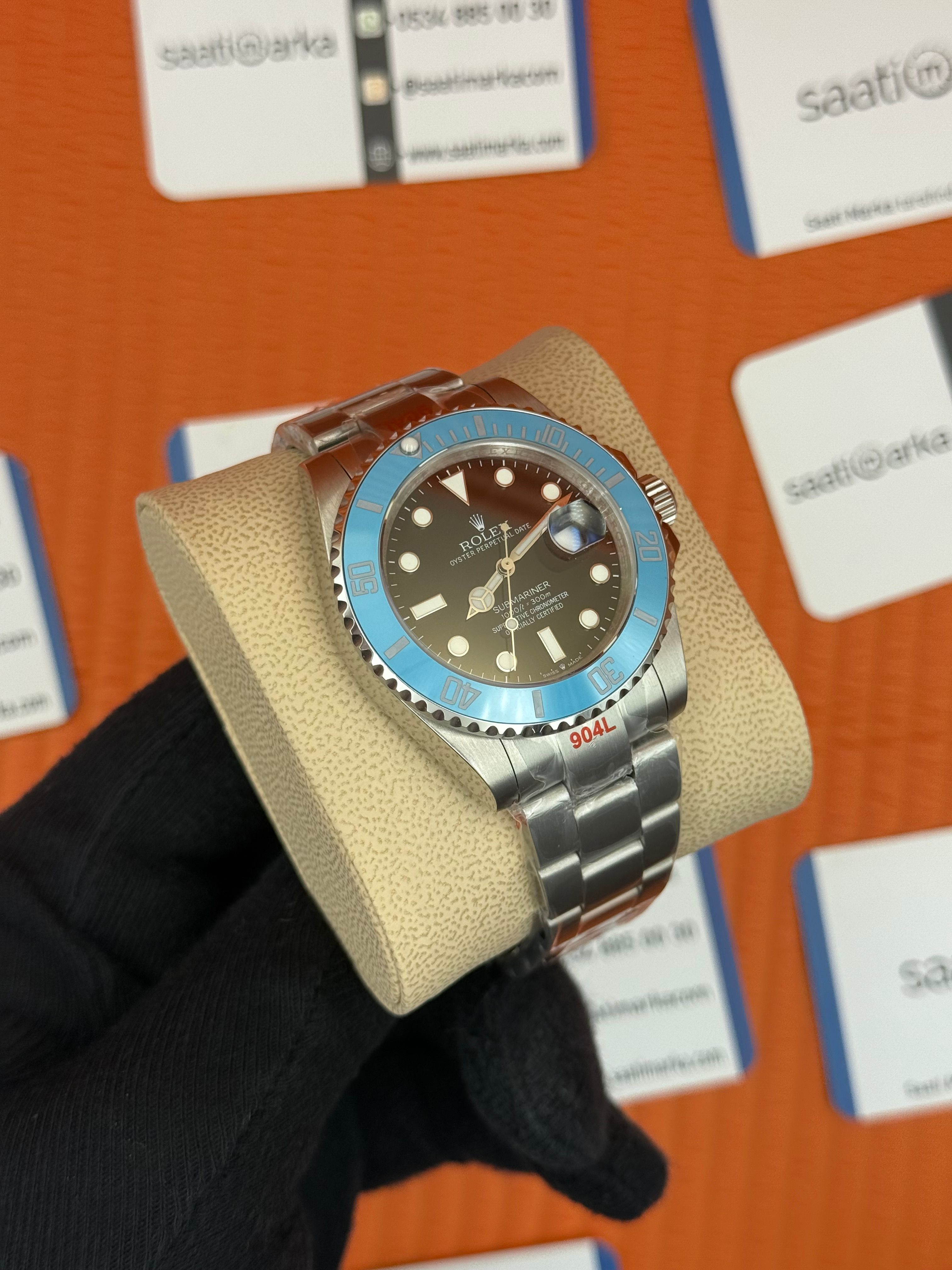 ROLEX Submariner black dial turquoise bezel silver oyster kordon