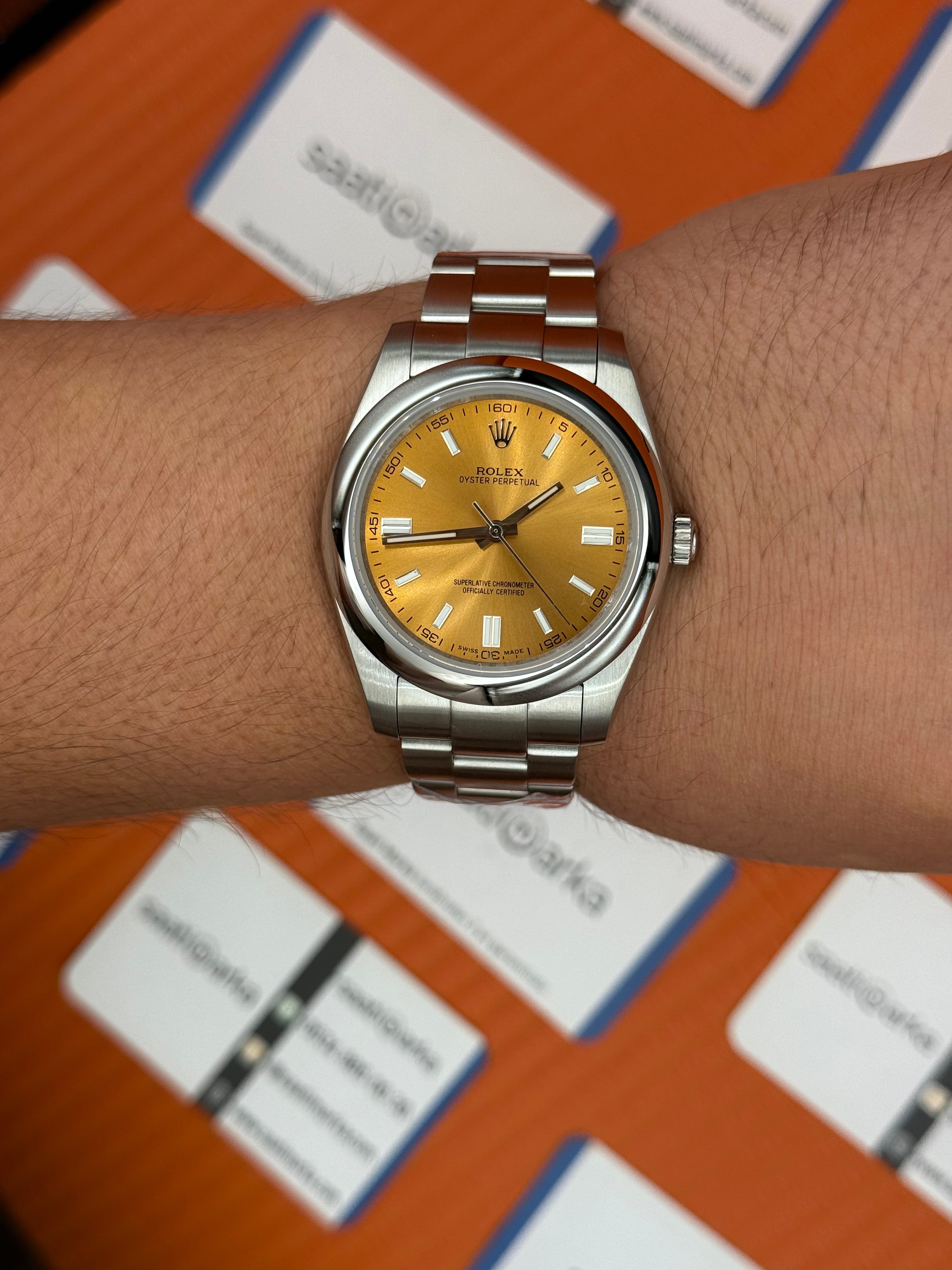 ROLEX oyster perpetual şampanya kadran silver kasa kordon erkek kol saati