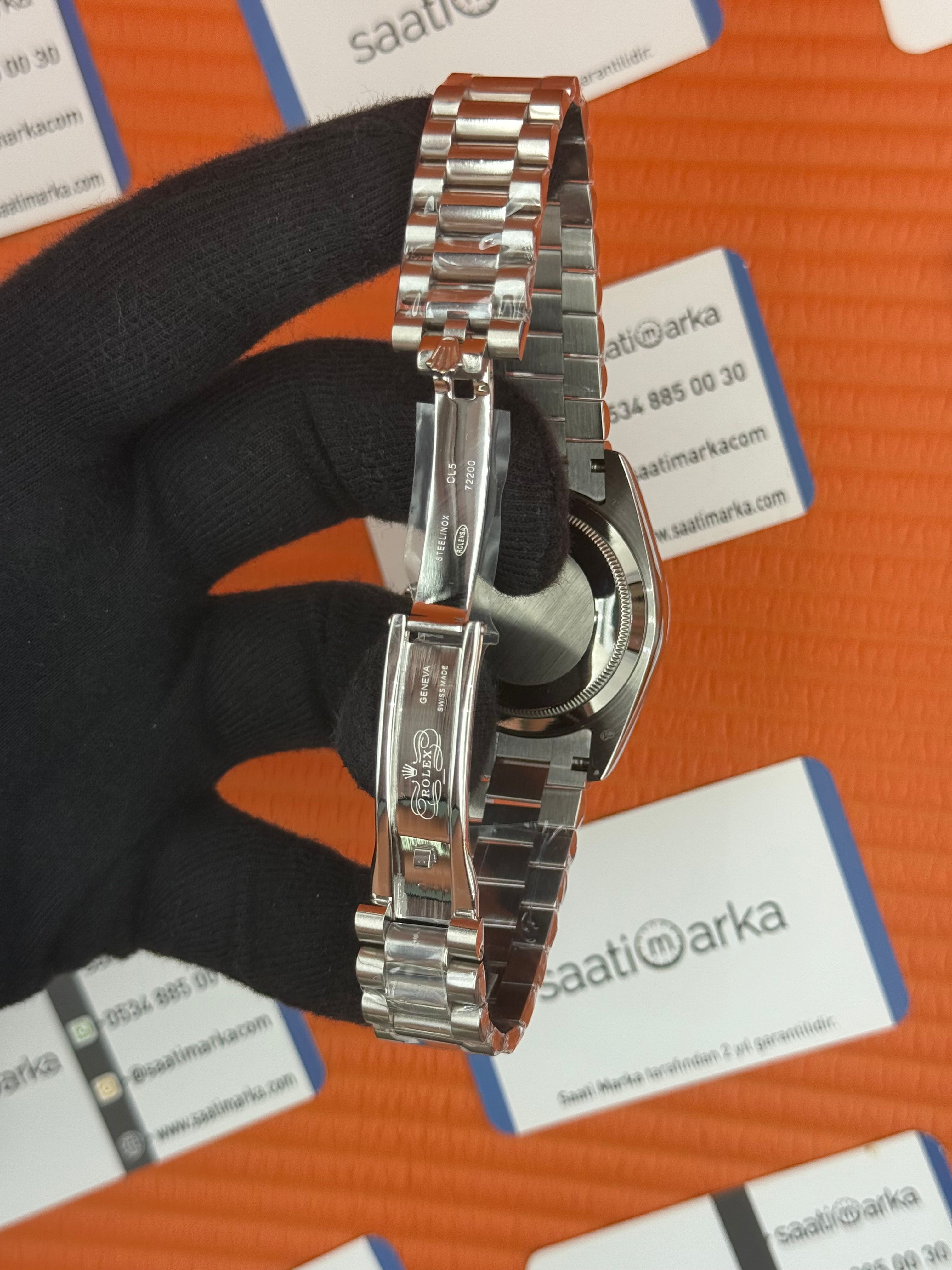 ROLEX Day Date baget taşlı beyaz kadran silver president kordon