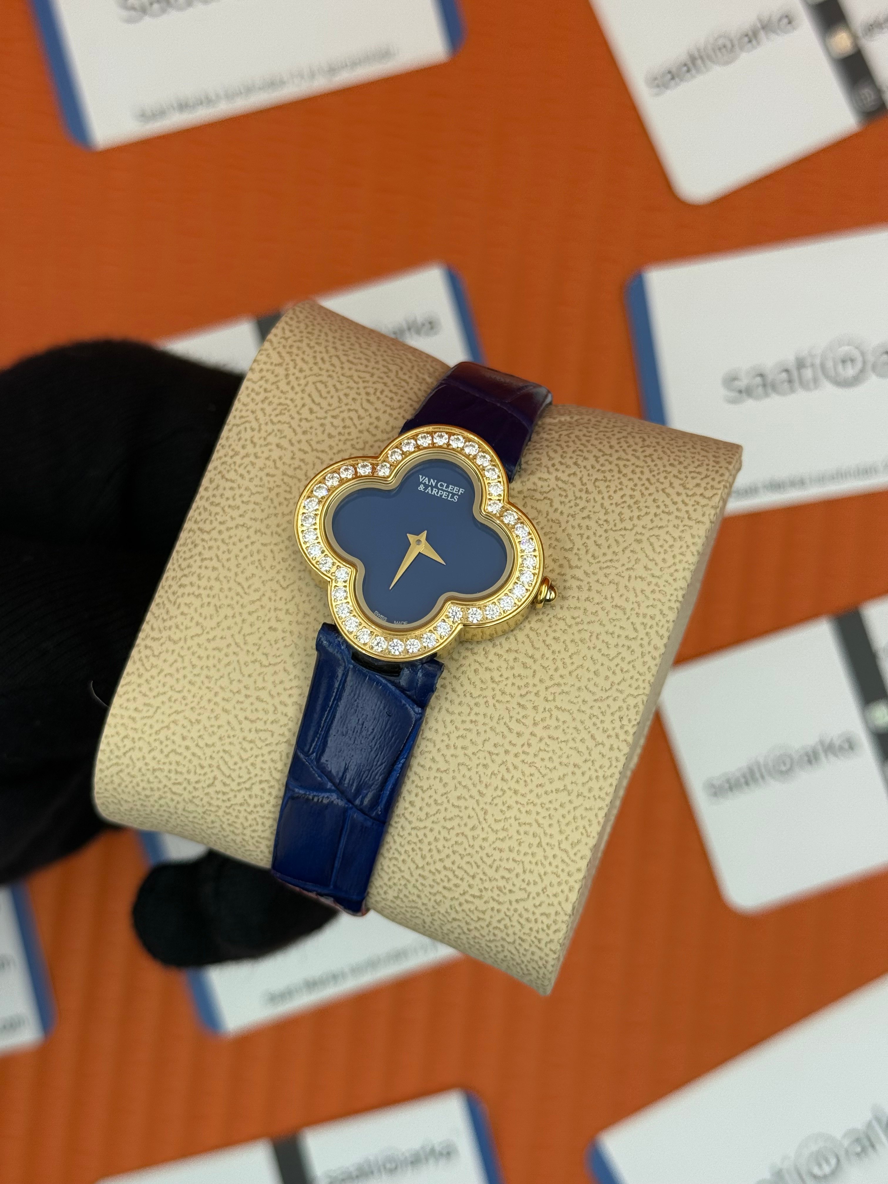 VAN CLEEF lacivert kadran lacivert deri kordon gold kasa taşlı bezel kadın kol saati