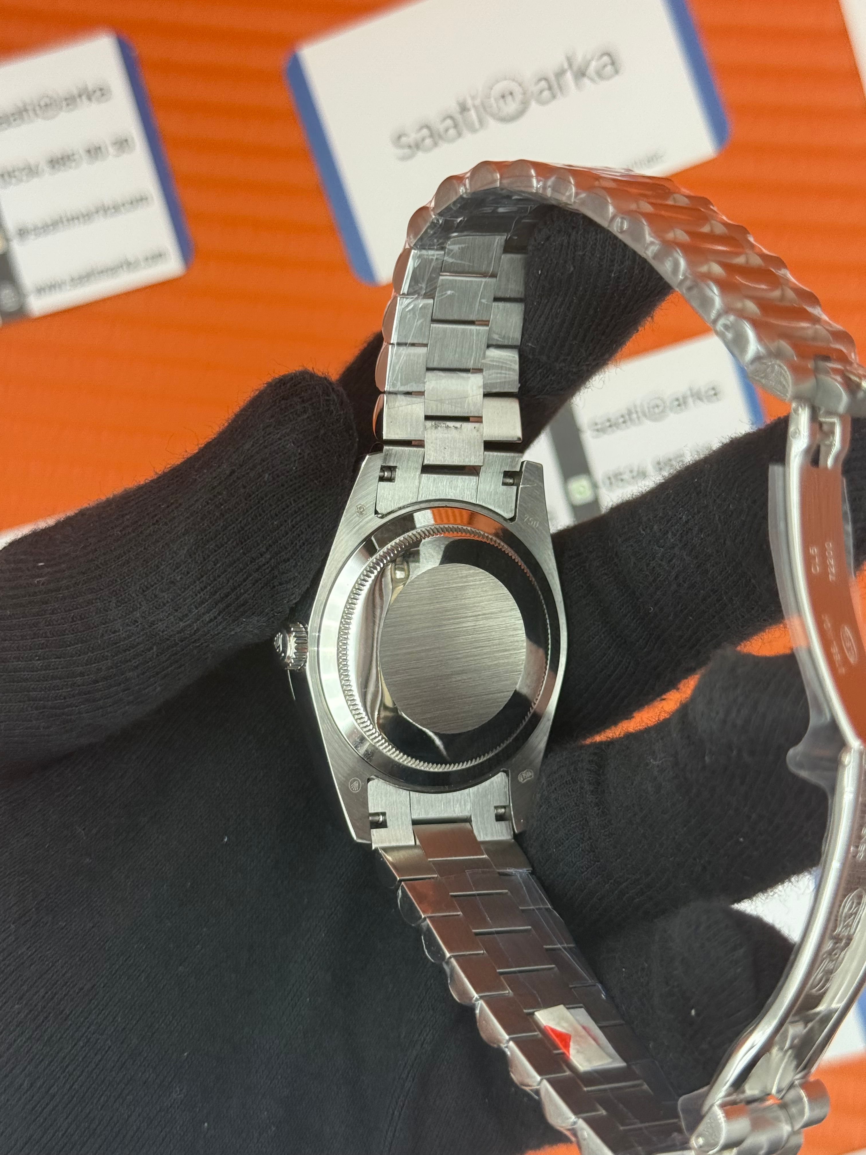 ROLEX Day Date baget taşlı mavi siyah kadran silver president kordon