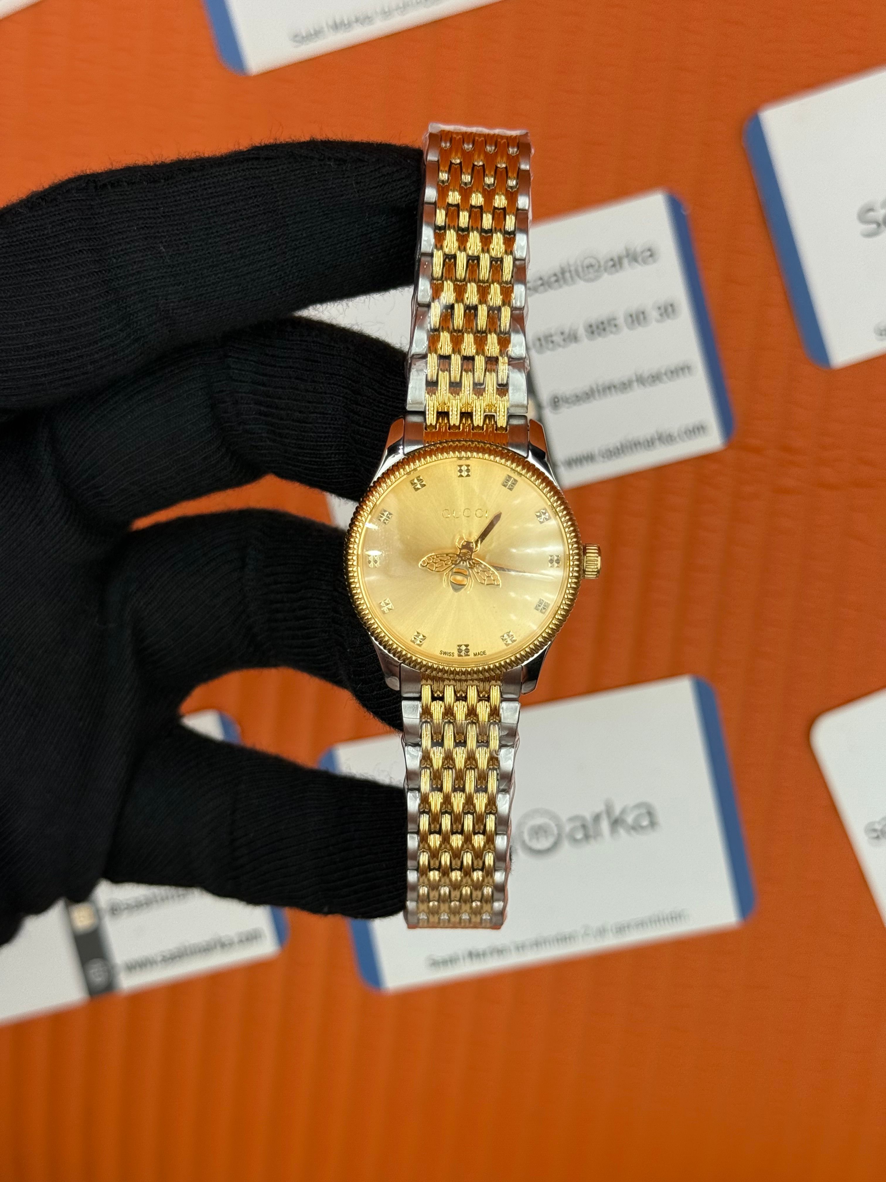 GUCCI sarı kadran gold silver kasa kordon kadın kol saati