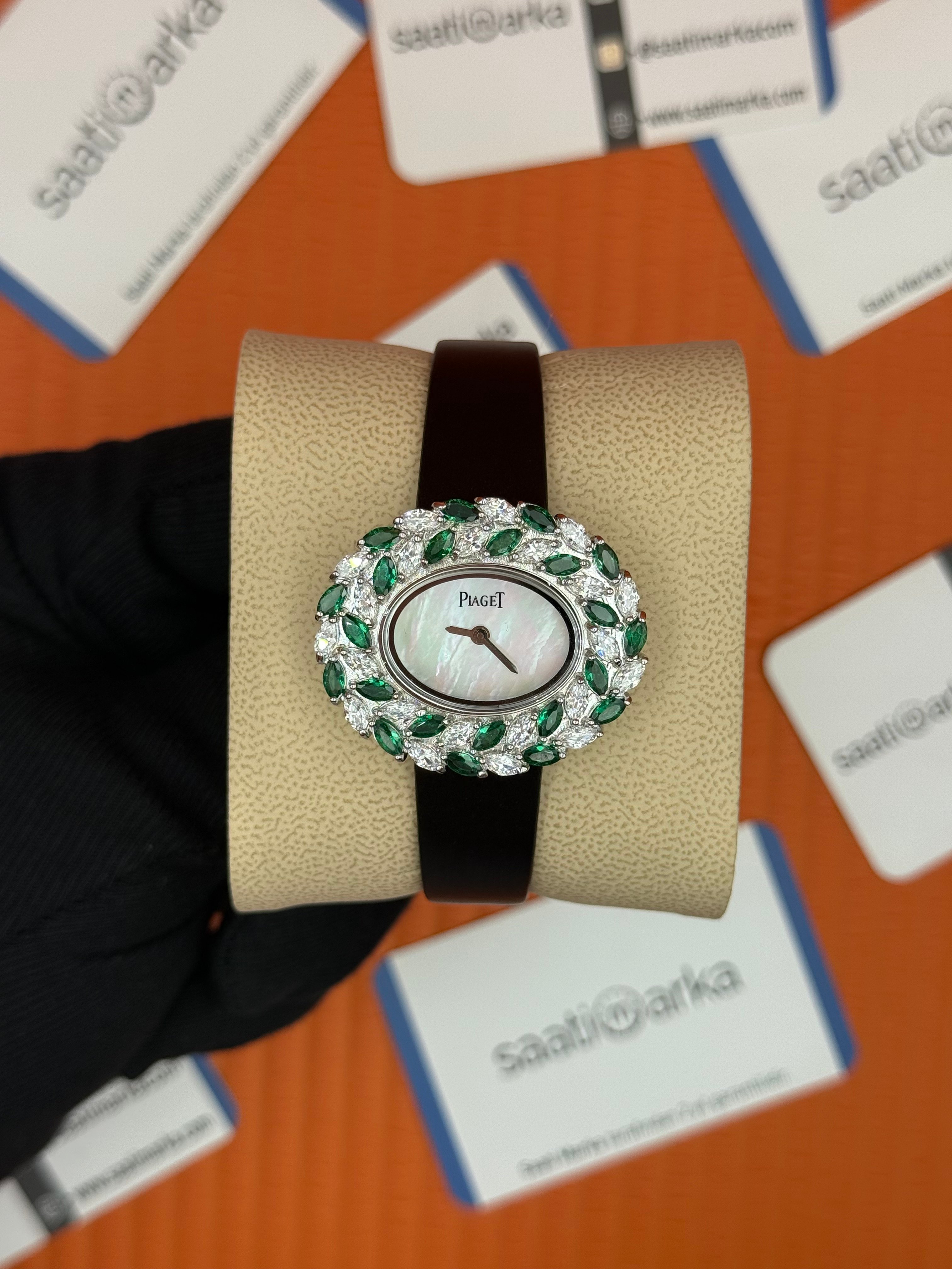 PIAGET taşlı bezel sedef kadran deri siyah kordon