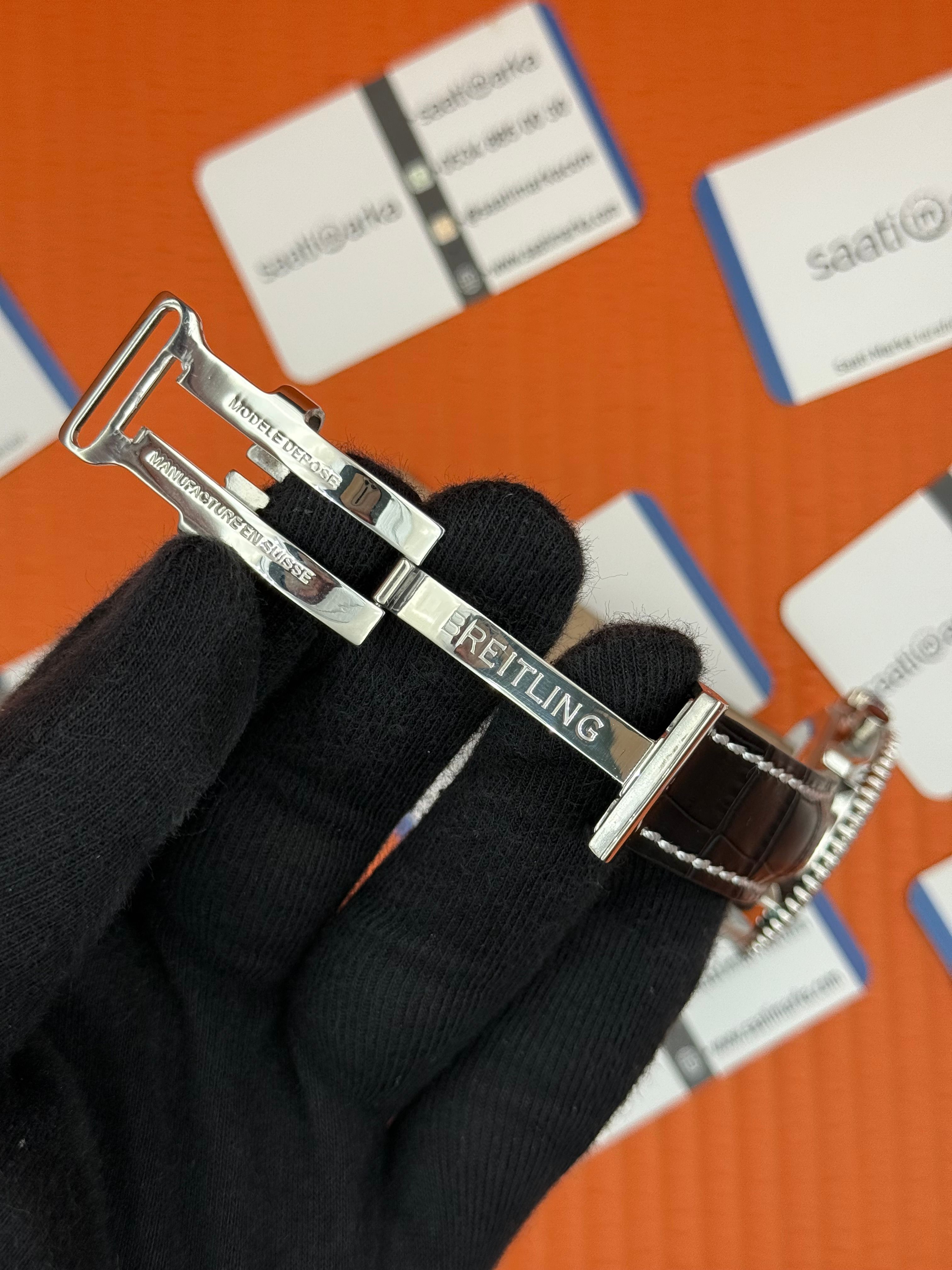 BREITLING Navitimer siyah deri kordon turuncu kadran çelik kasa 