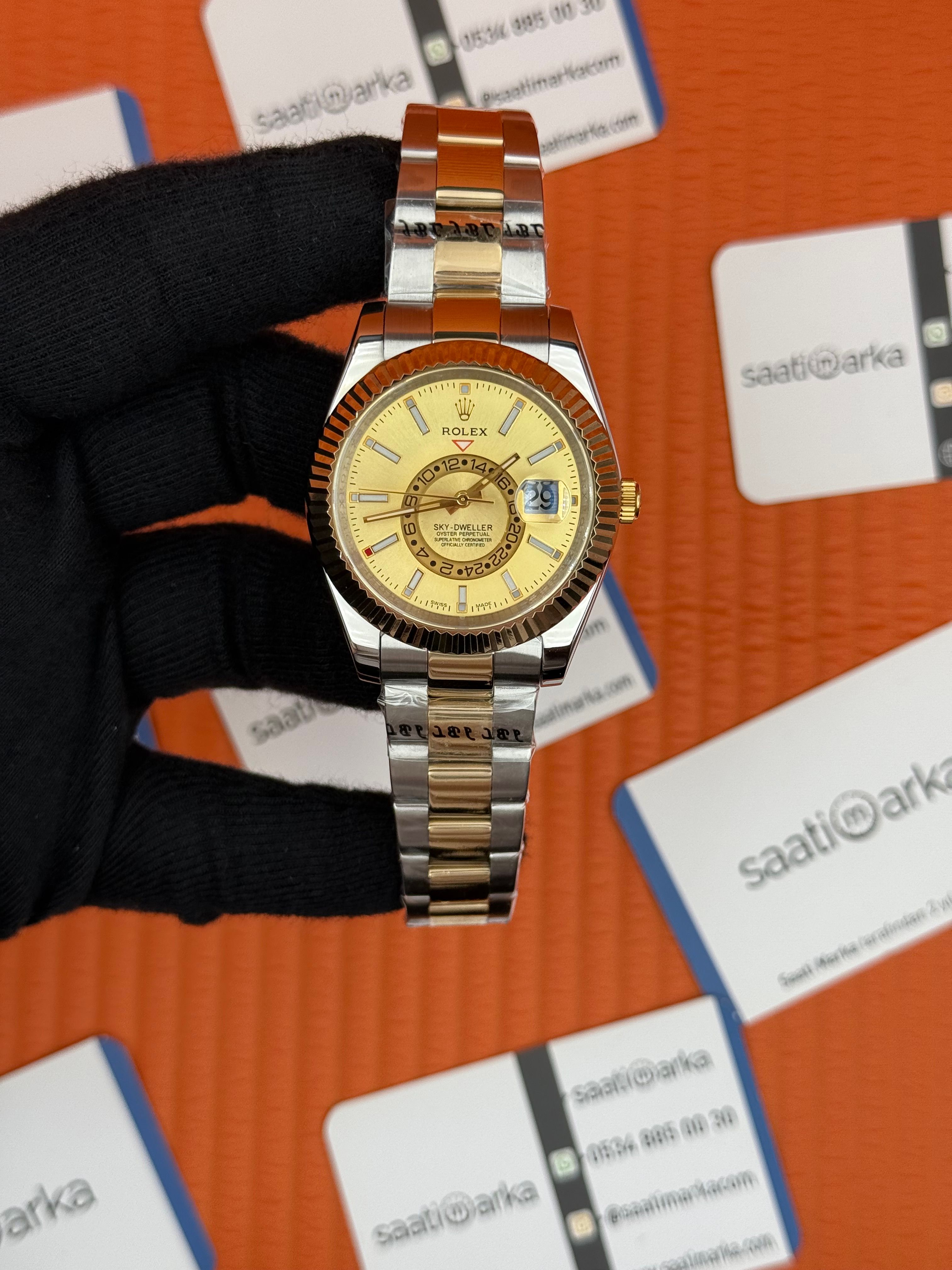ROLEX Sky Dweller champagne dial oyster kordon gold silver kasa-kordon