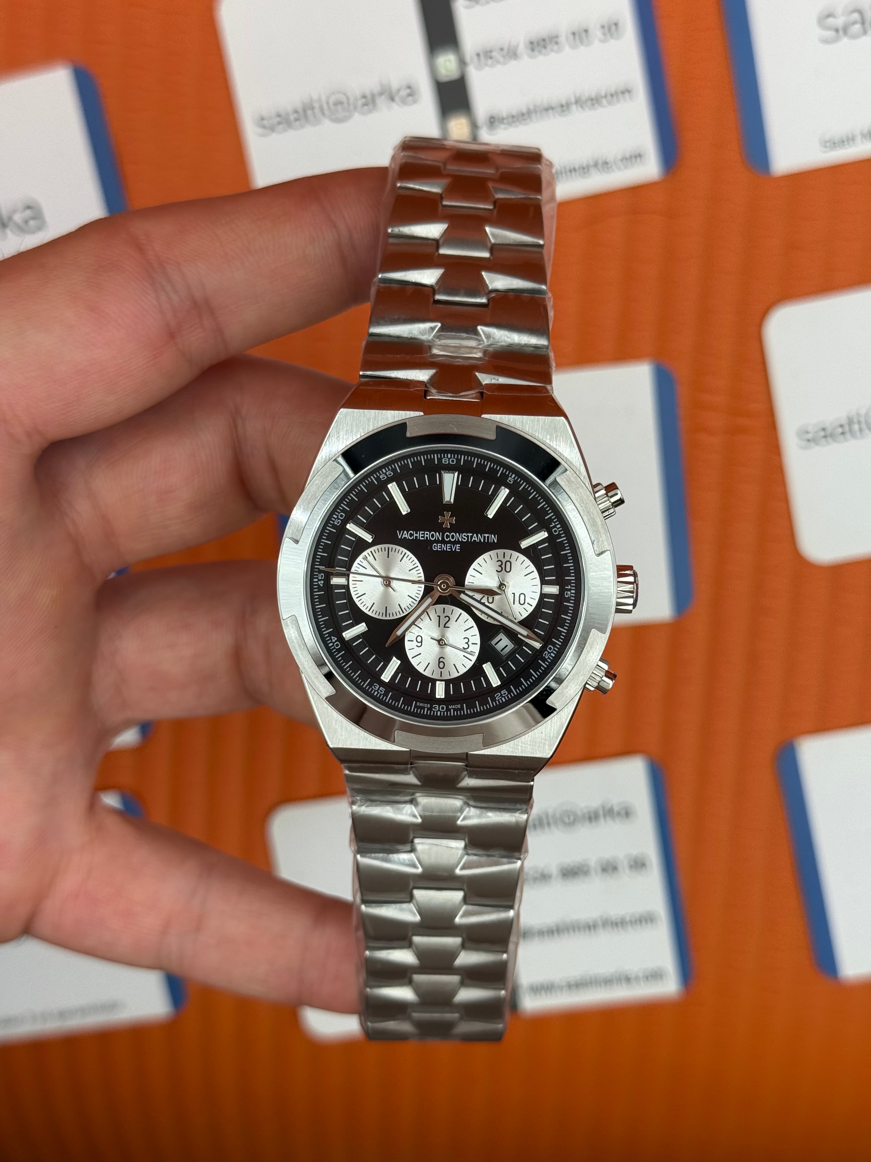VACHERON CONSTANTIN overseas chronograph siyah kadran silver kasa kordon erkek kol saati