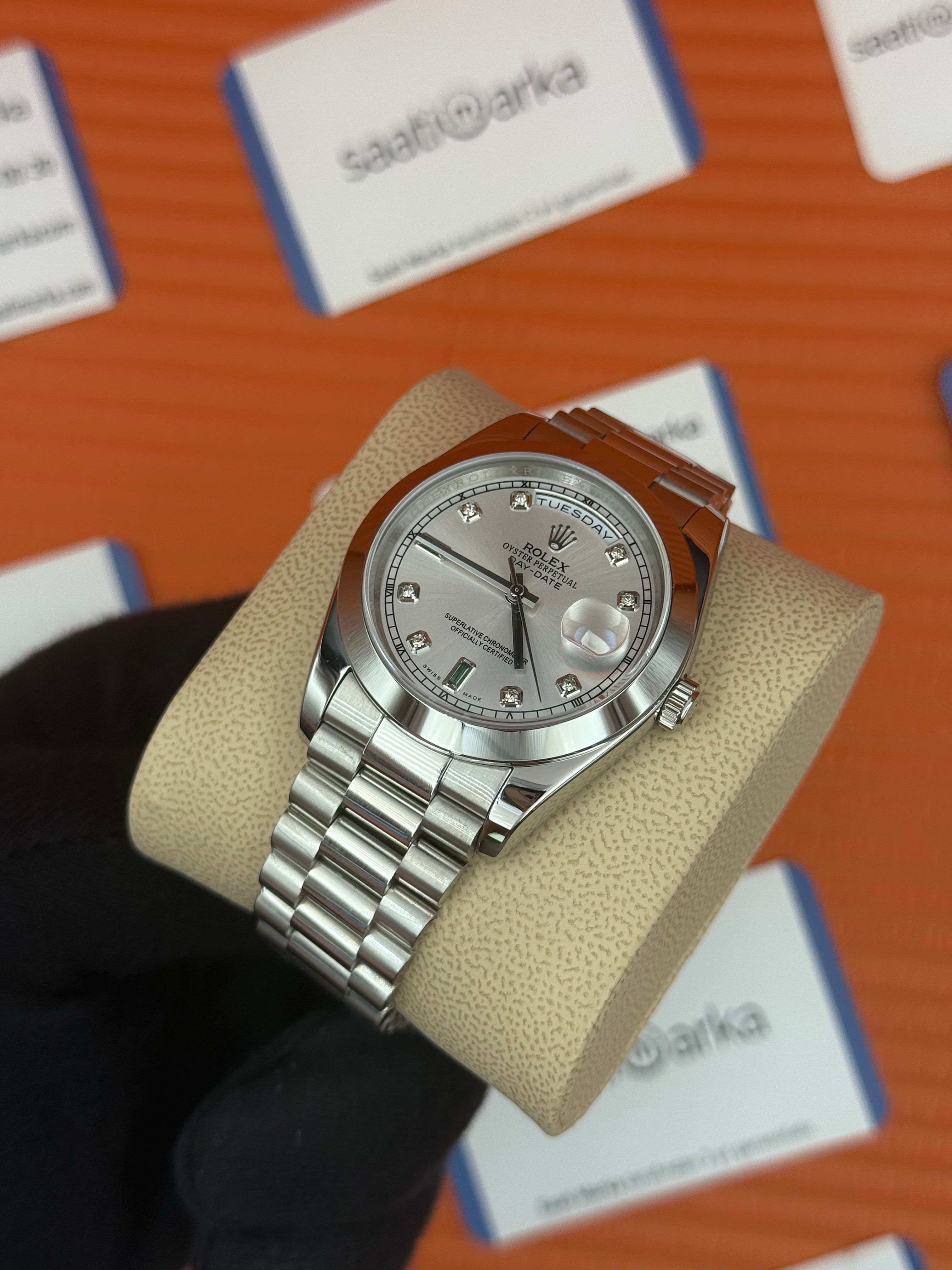 ROLEX Day Date baget taşlı beyaz kadran silver president kordon