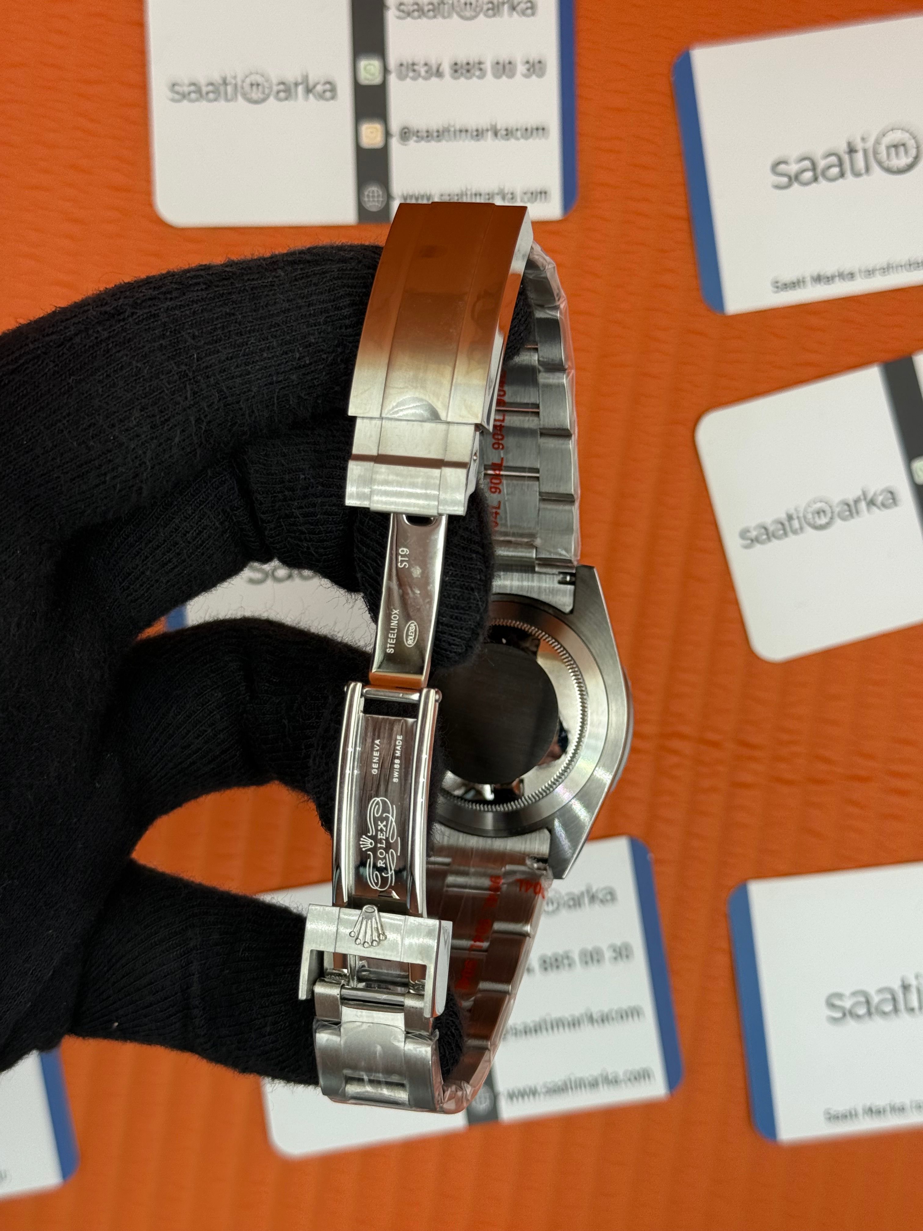 ROLEX Submariner black dial turquoise bezel silver oyster kordon