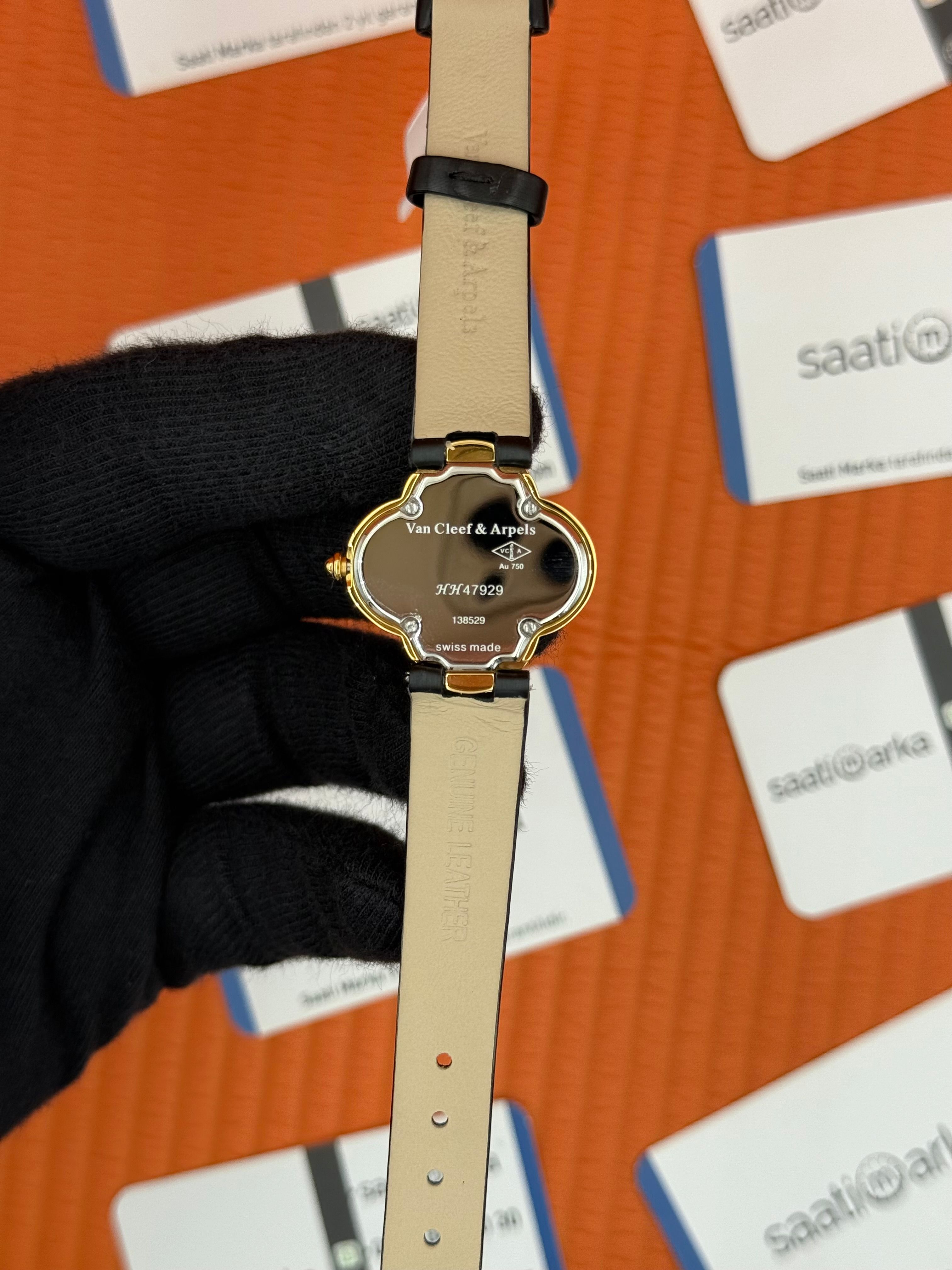 VAN CLEEF beyaz kadran gold kasa bezel kadın kol saati