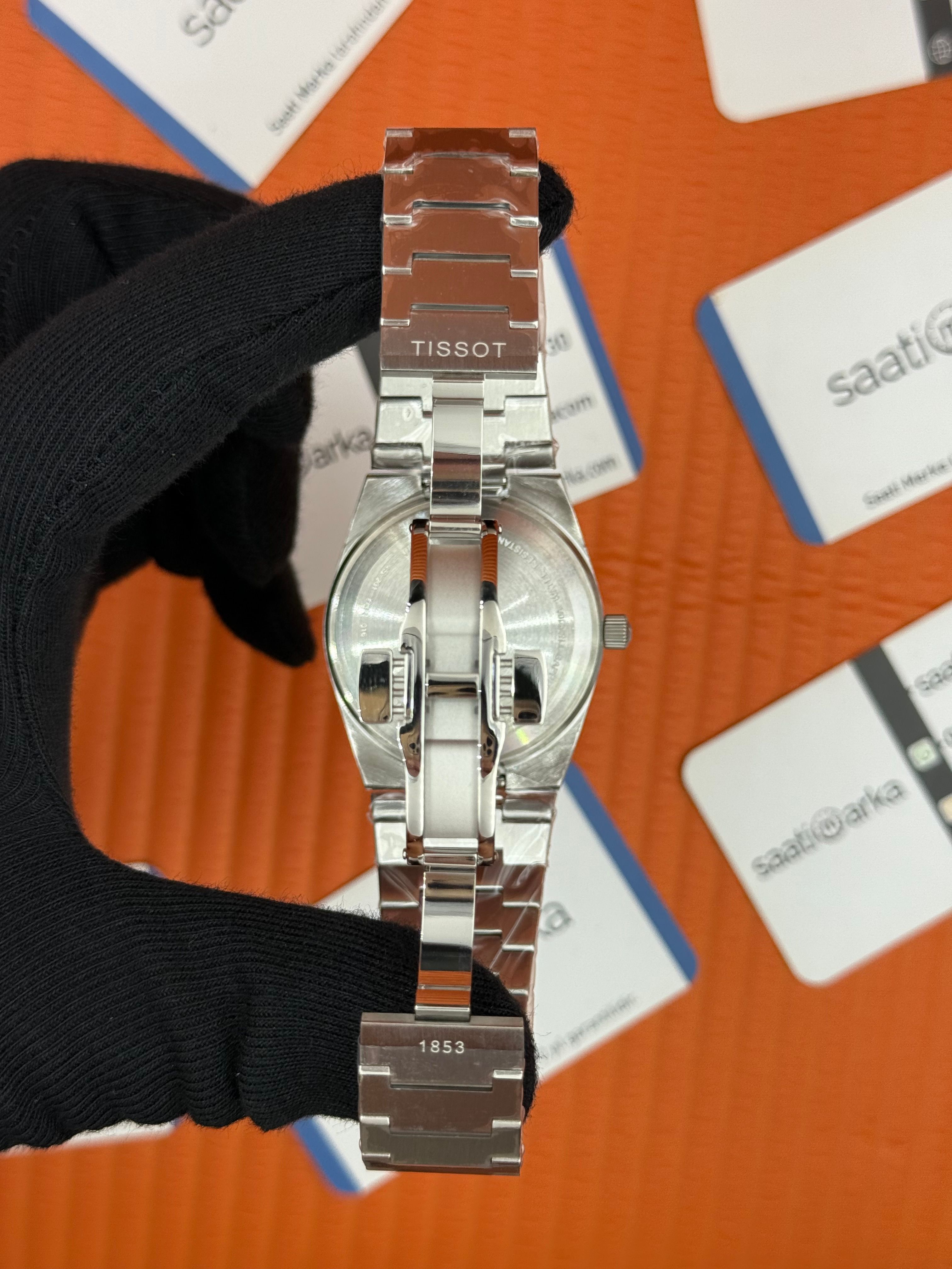 TISSOT PRX 40MM beyaz kadran silver kasa kordon erkek kol saati