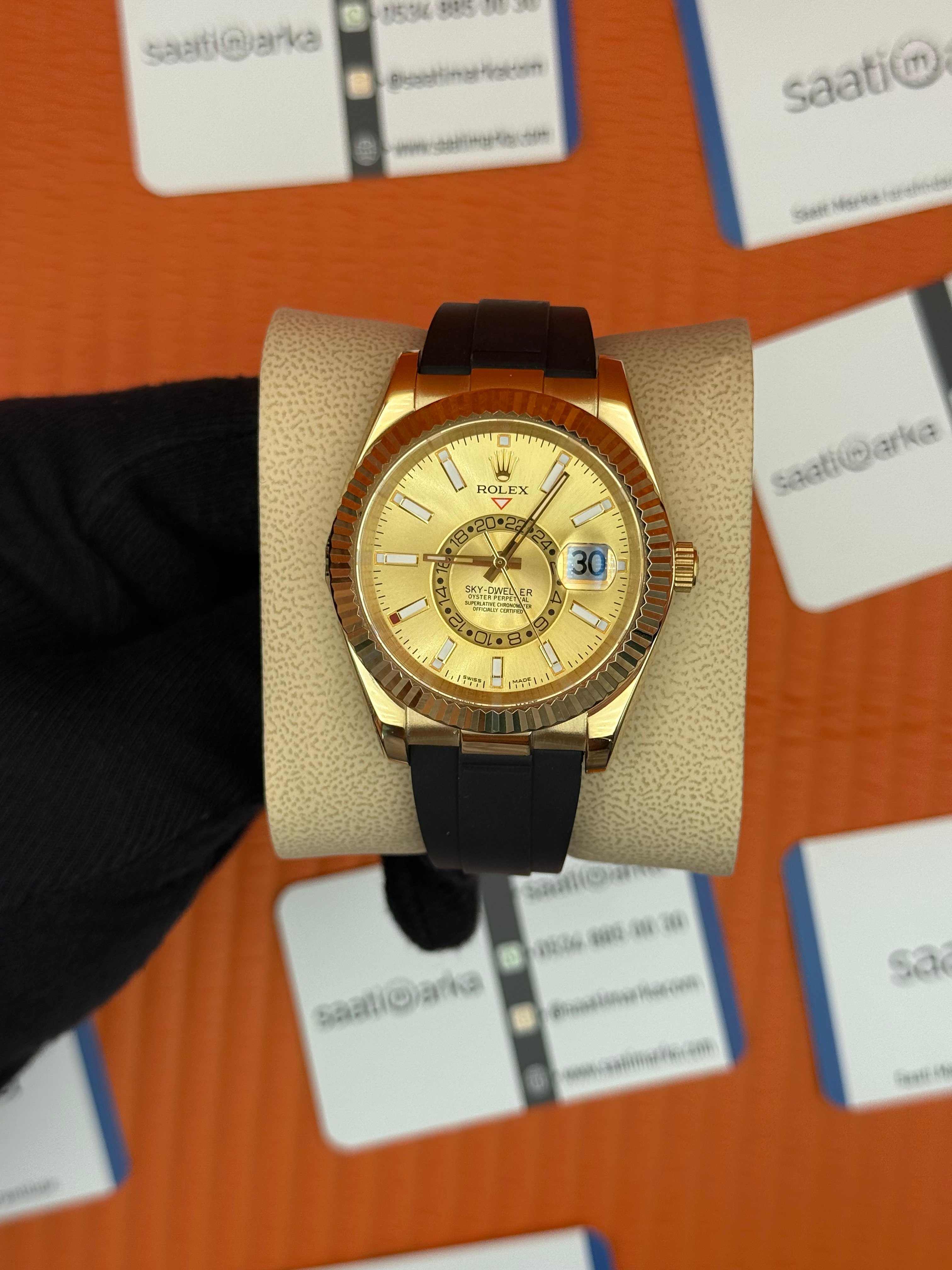 ROLEX Sky Dweller champagne dial gold kasa siyah kauçuk kordon
