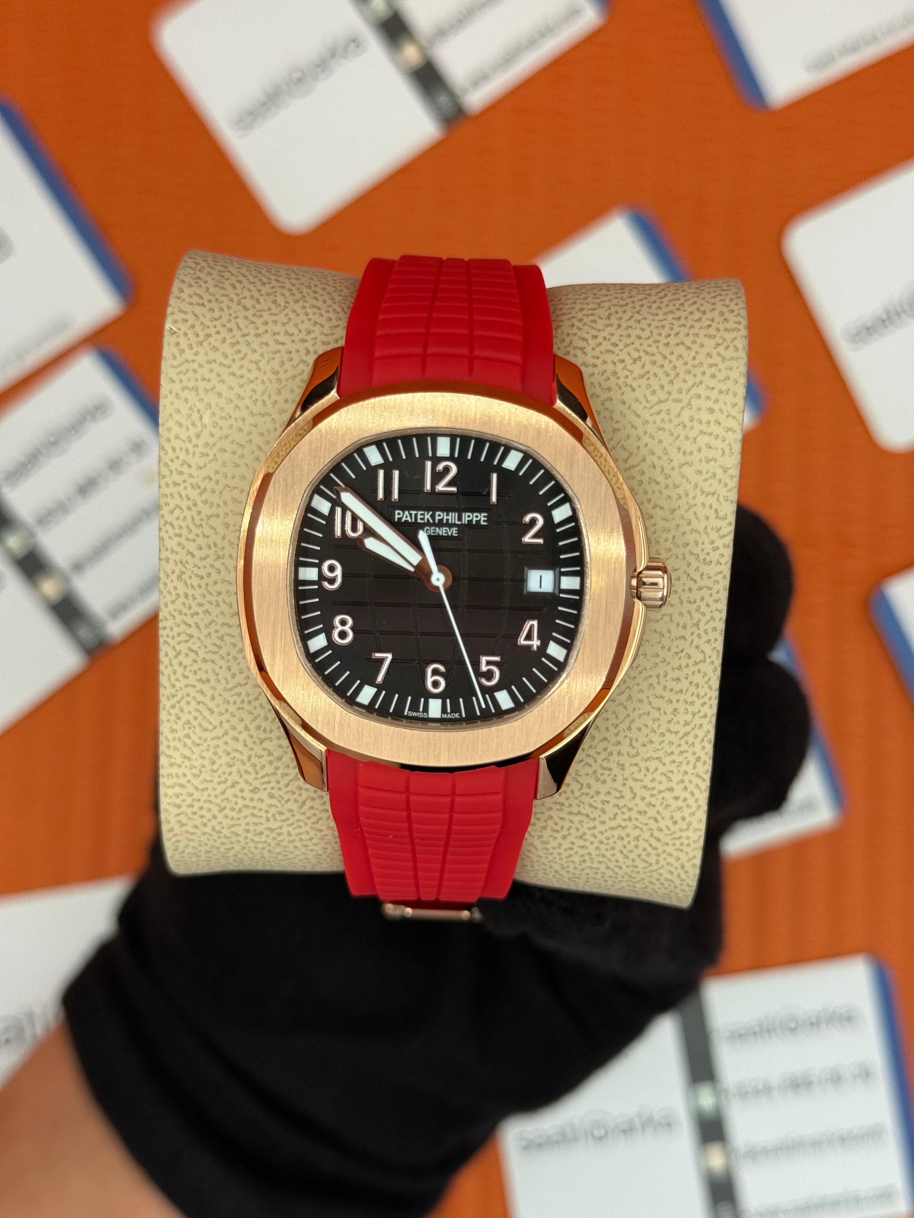 PATEK PHILIPPE AQUANAUT SİYAH KADRAN KIRMIZI KAUÇUK KORDON ROSE KASA 