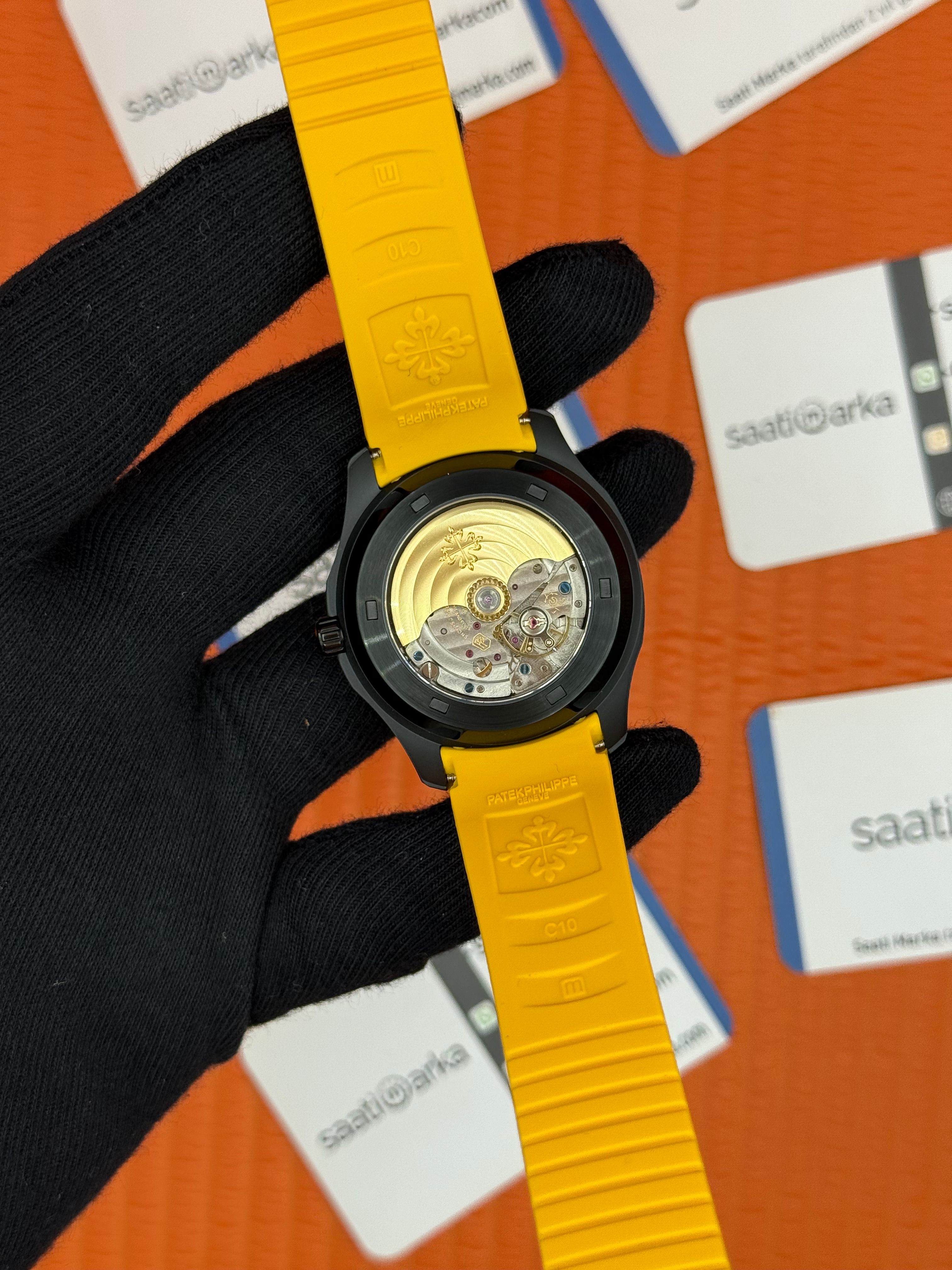 PATEK PHILIPPE Aquanaut sarı kadran sarı kauçuk kordon çelik siyah kasa