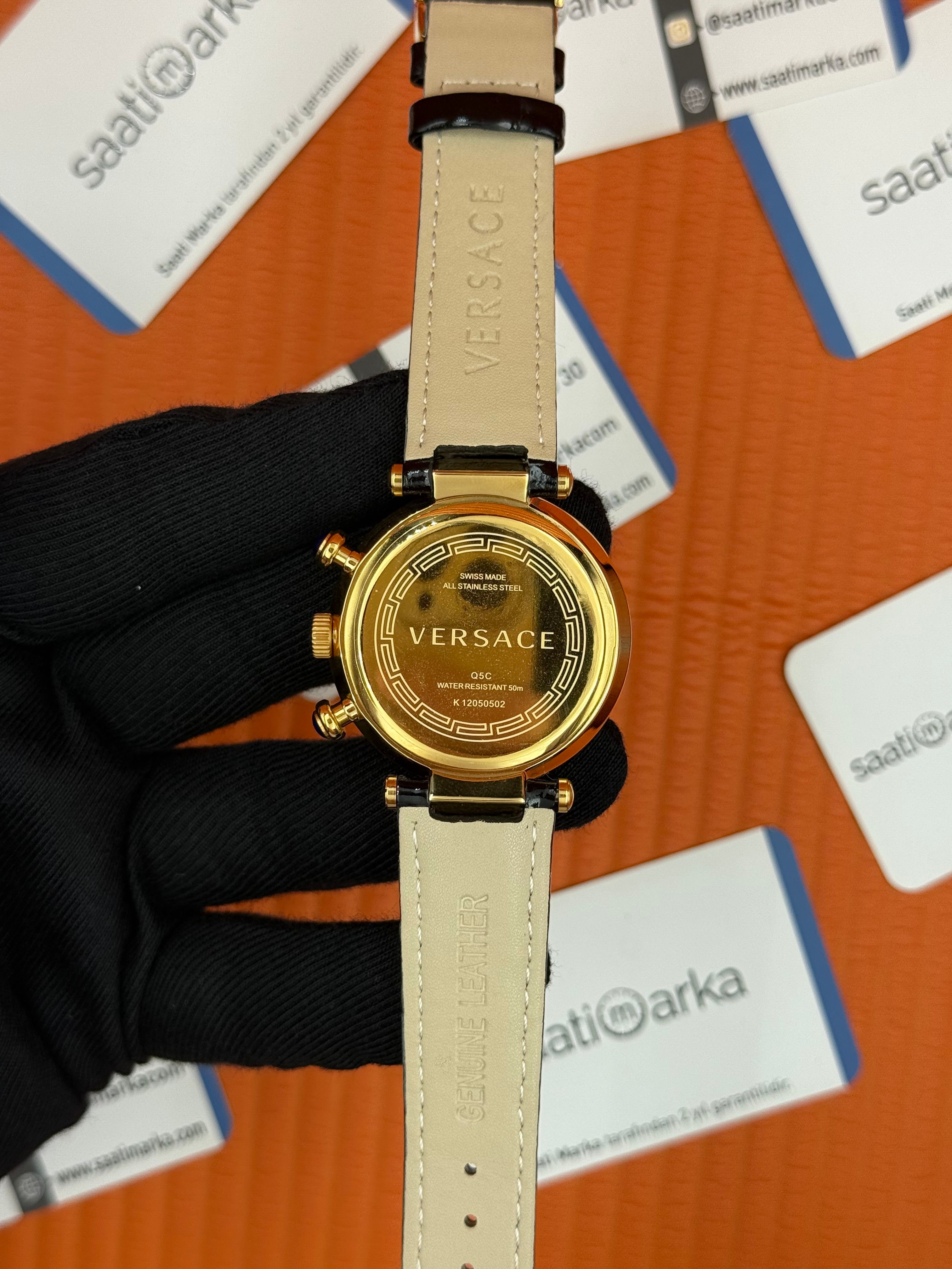 VERSACE taşlı bezel siyah kadran siyah deri kordon gold kasa kadın kol saati