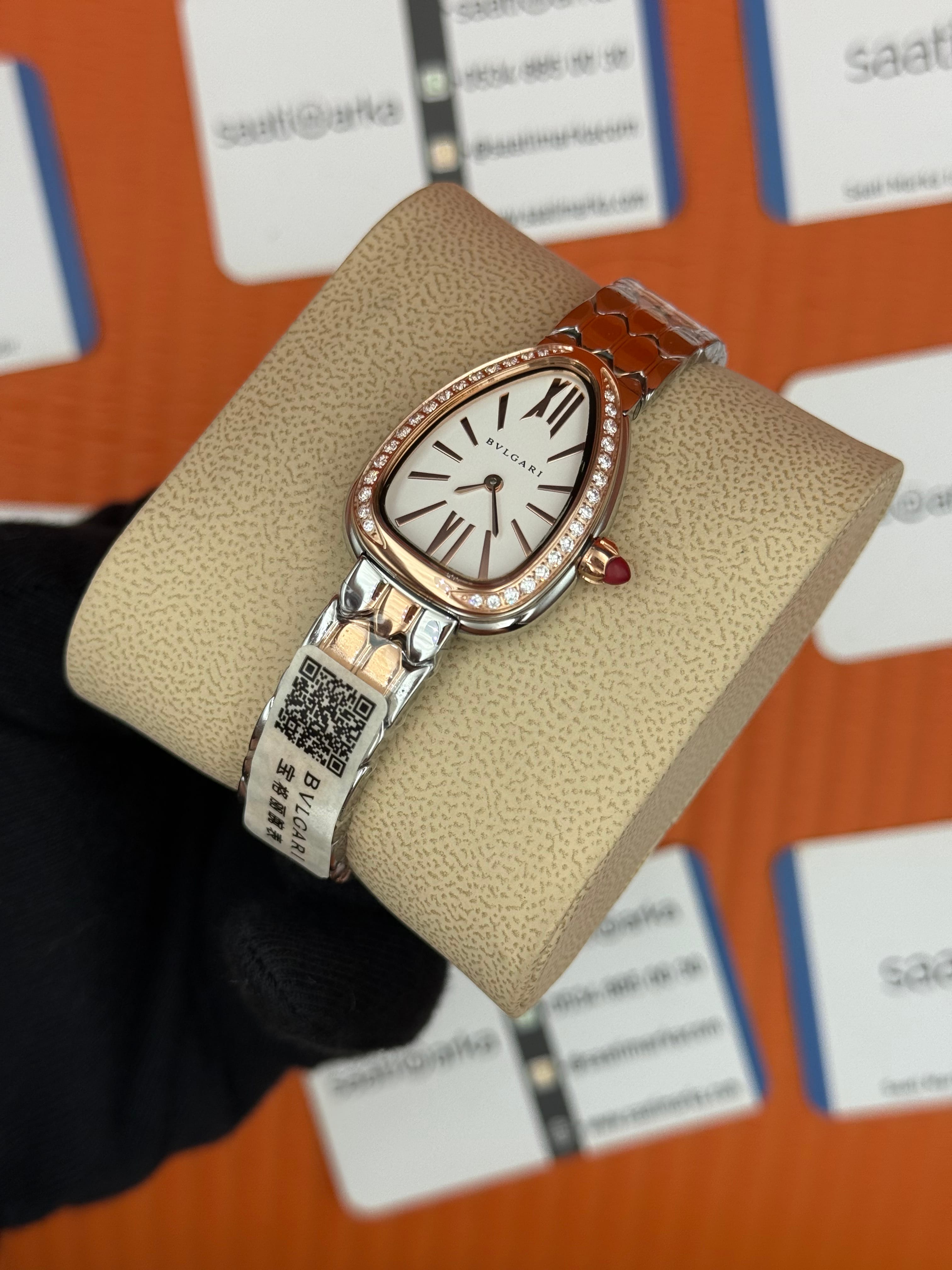 BVLGARİ serpenti seduttori taşlı bezel beyaz kadran rose kasa kordon kadın kol saati