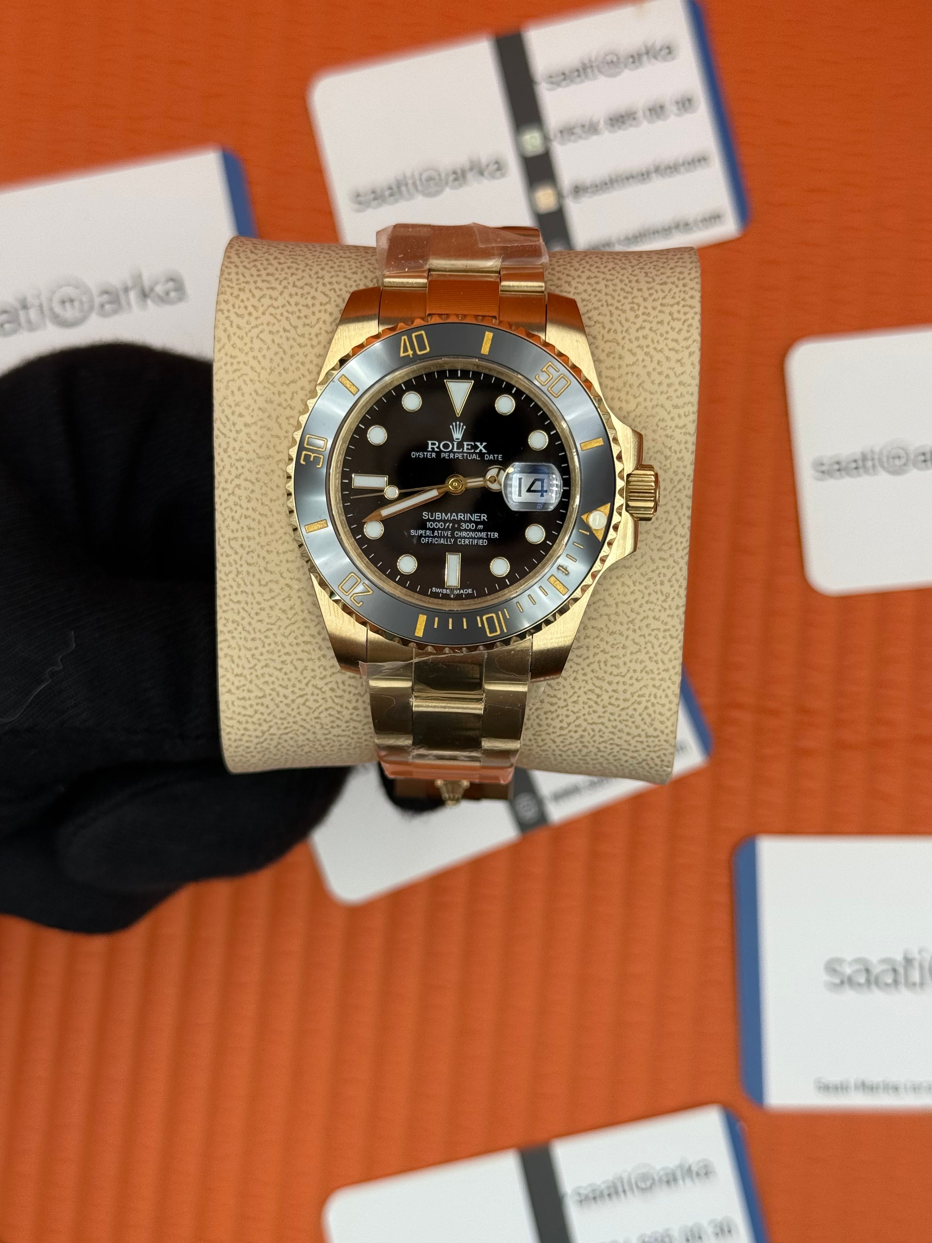ROLEX Submariner oyster blacil dial gold kasa-kordon