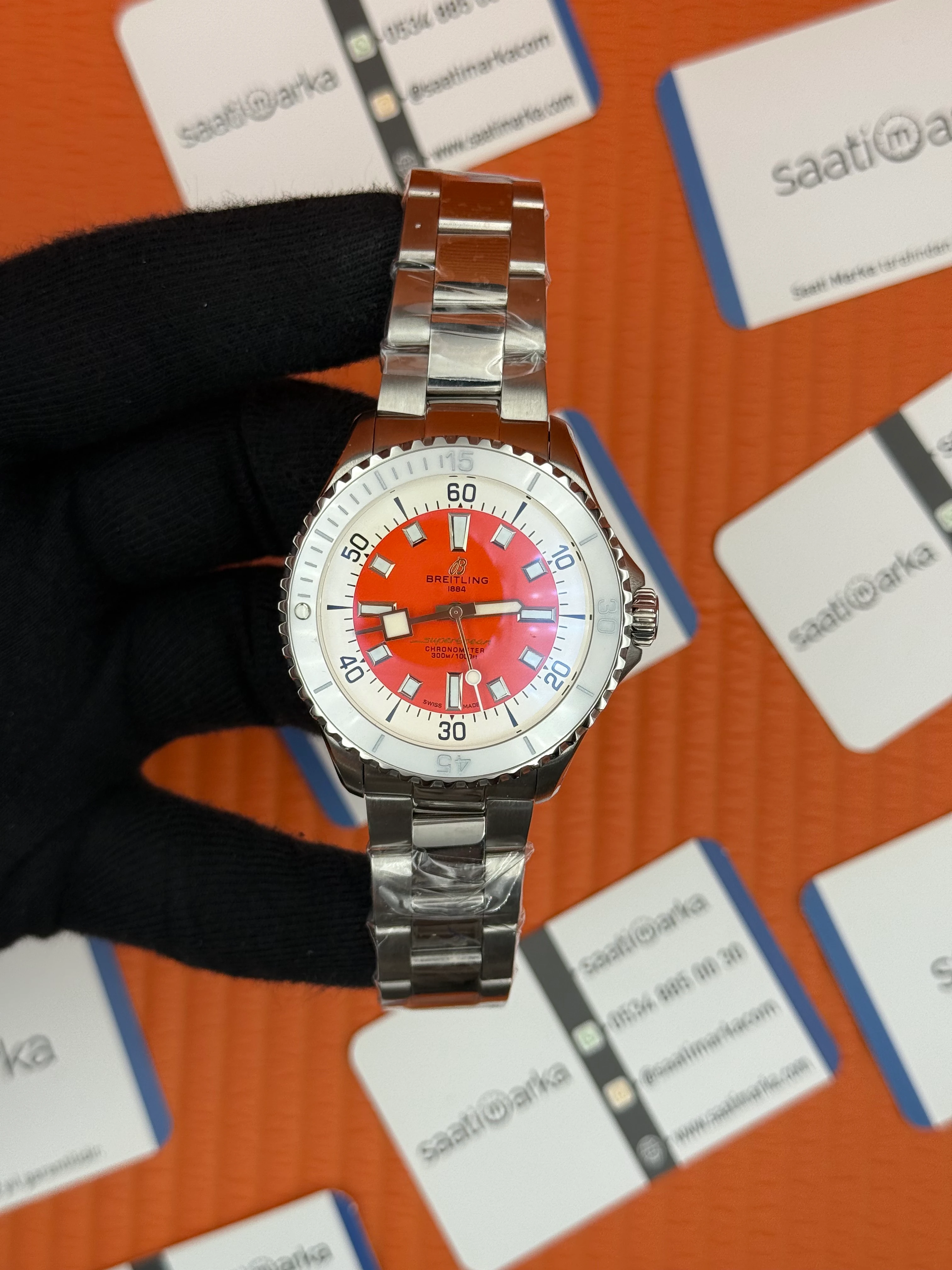 BREITLING Superocean çelik kasa kordon turuncu kadran