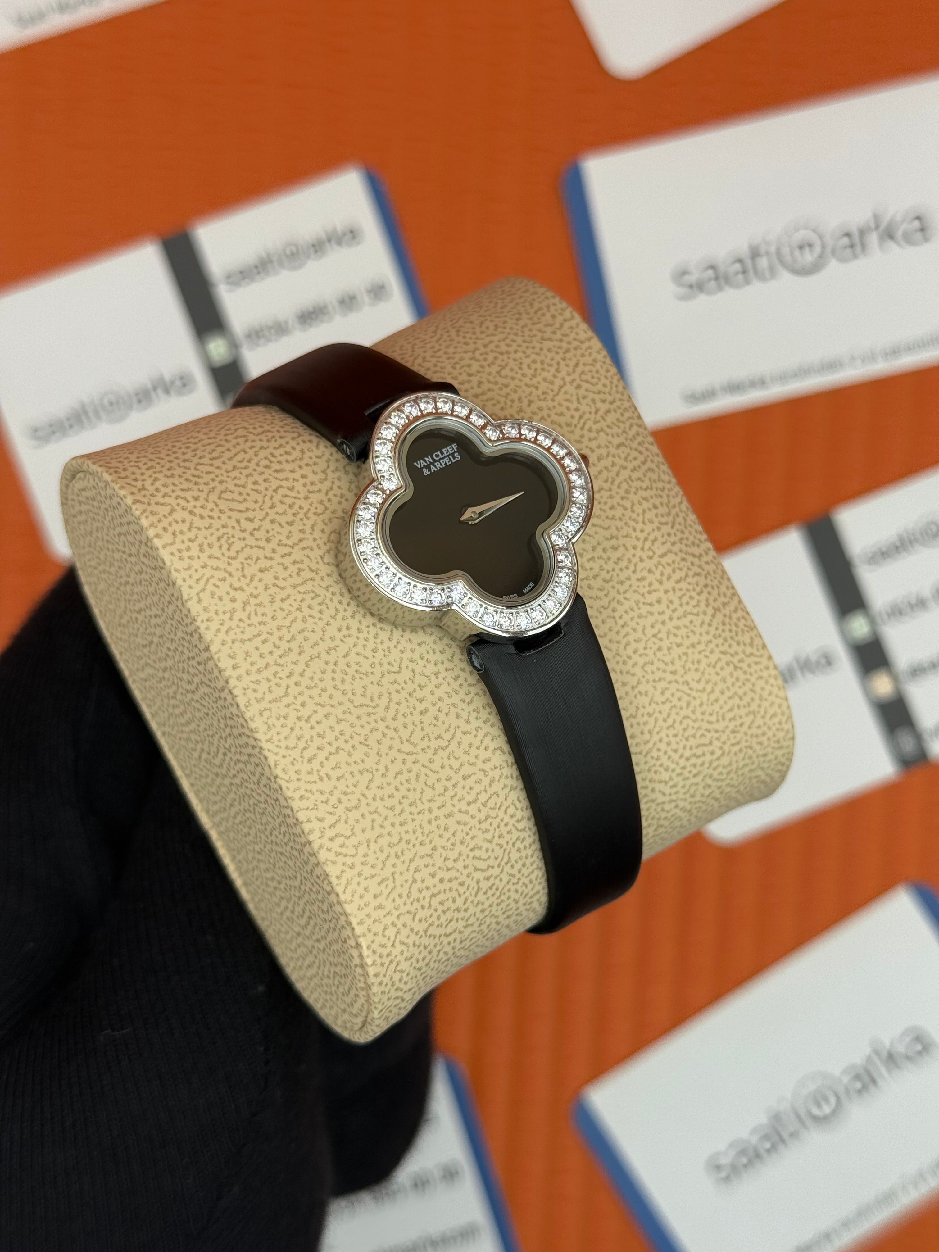 VAN CLEEF siyah kadran taşlı bezel deri kordon kadın kol saati 