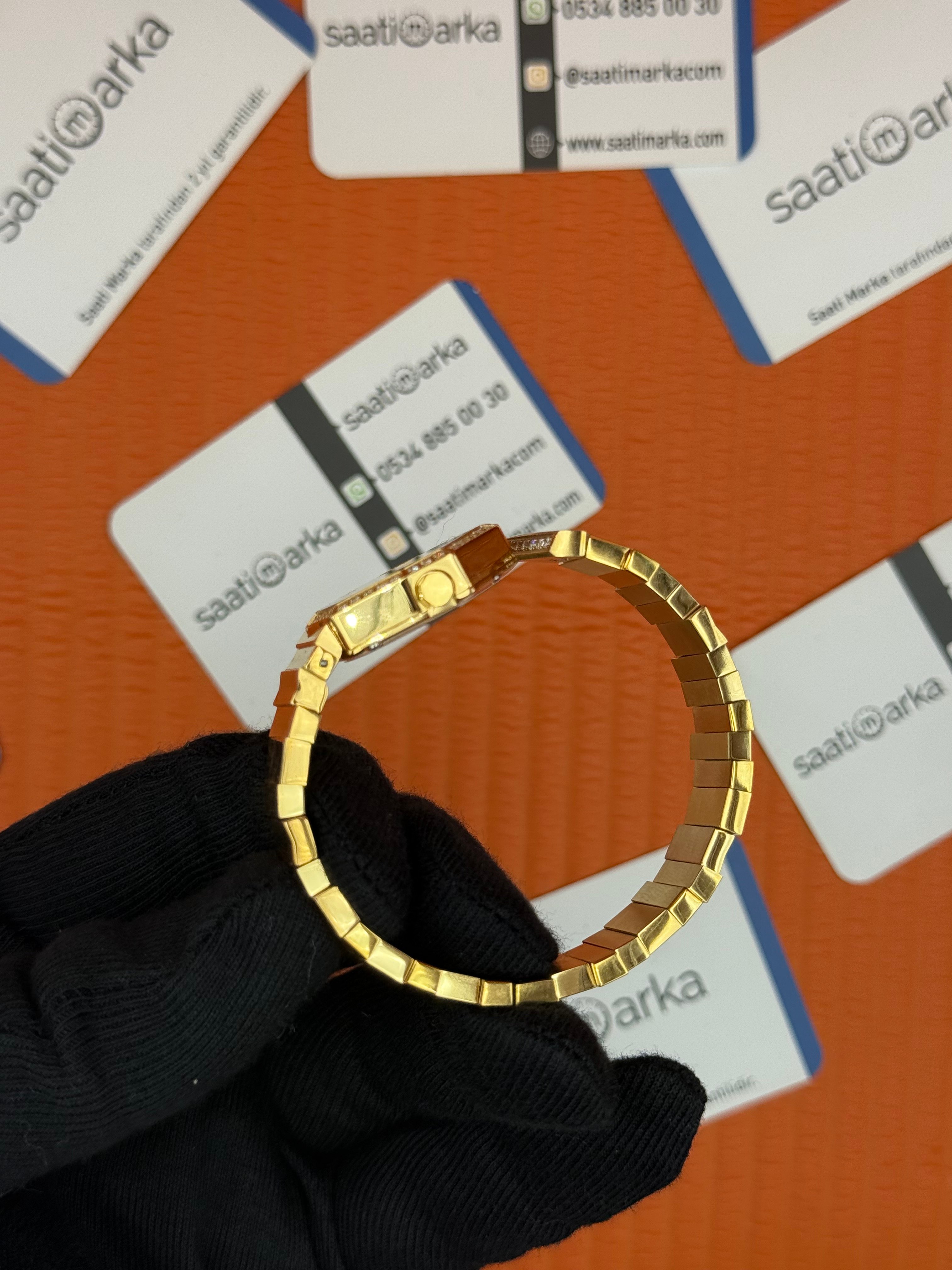 DİOR sedefli kadran taşlı bezel gold kasa kordon kadın kol saati