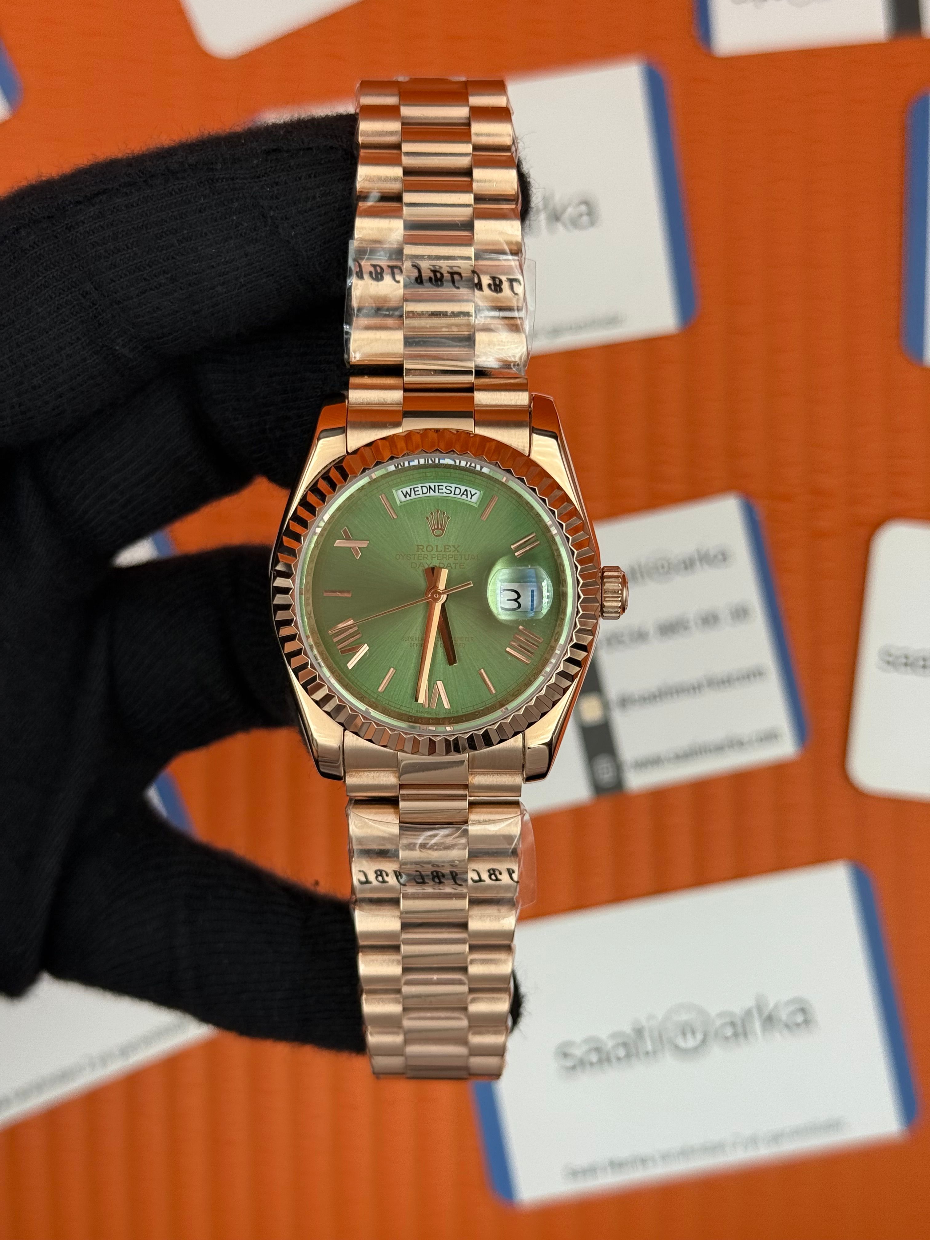 ROLEX day date 36mm yeşil roma rakamlı kadran rose kasa-kordon president 