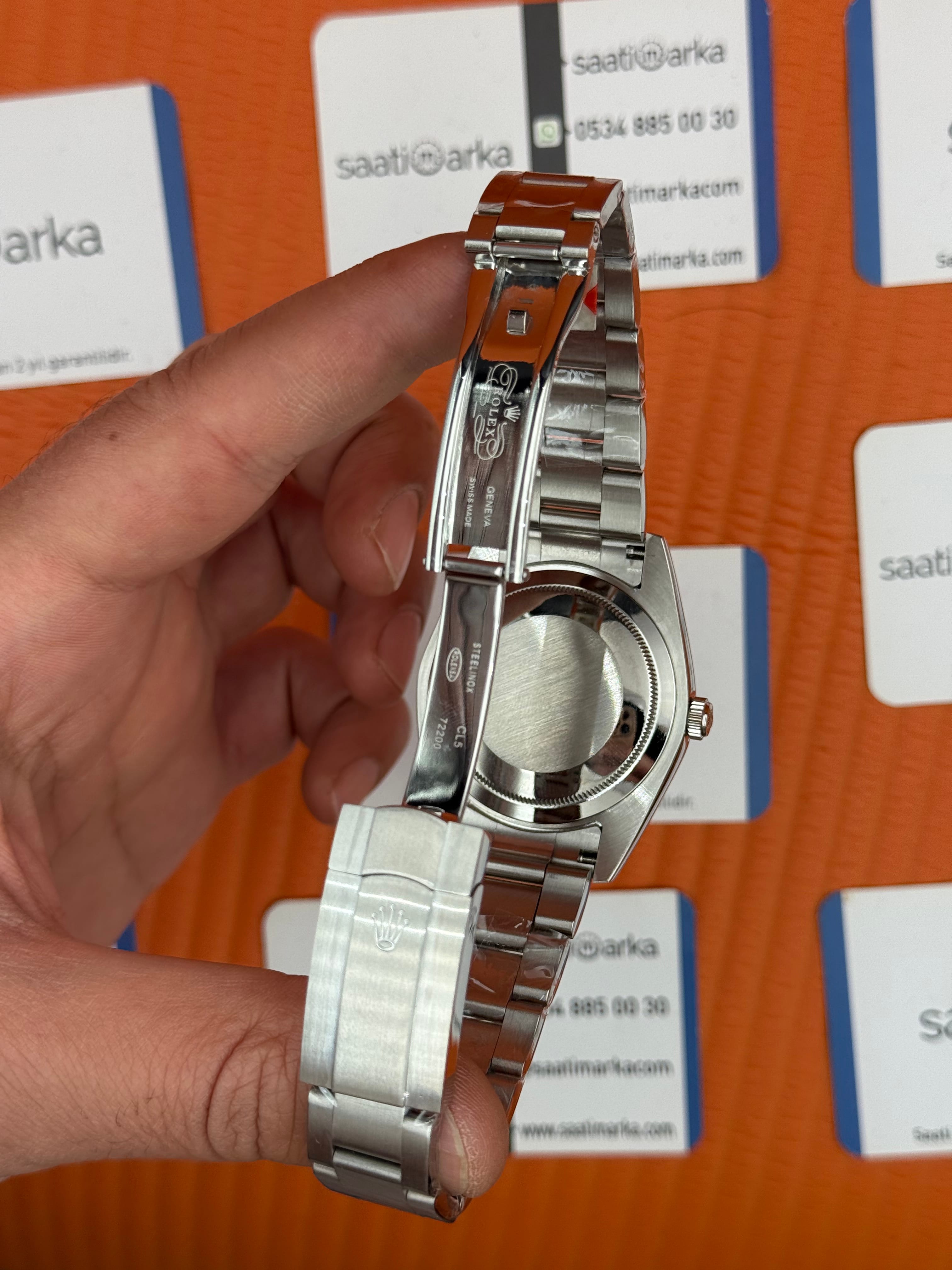 ROLEX oyster perpetual fıstık yeşili kadran silver kasa kordon erkek kol saati
