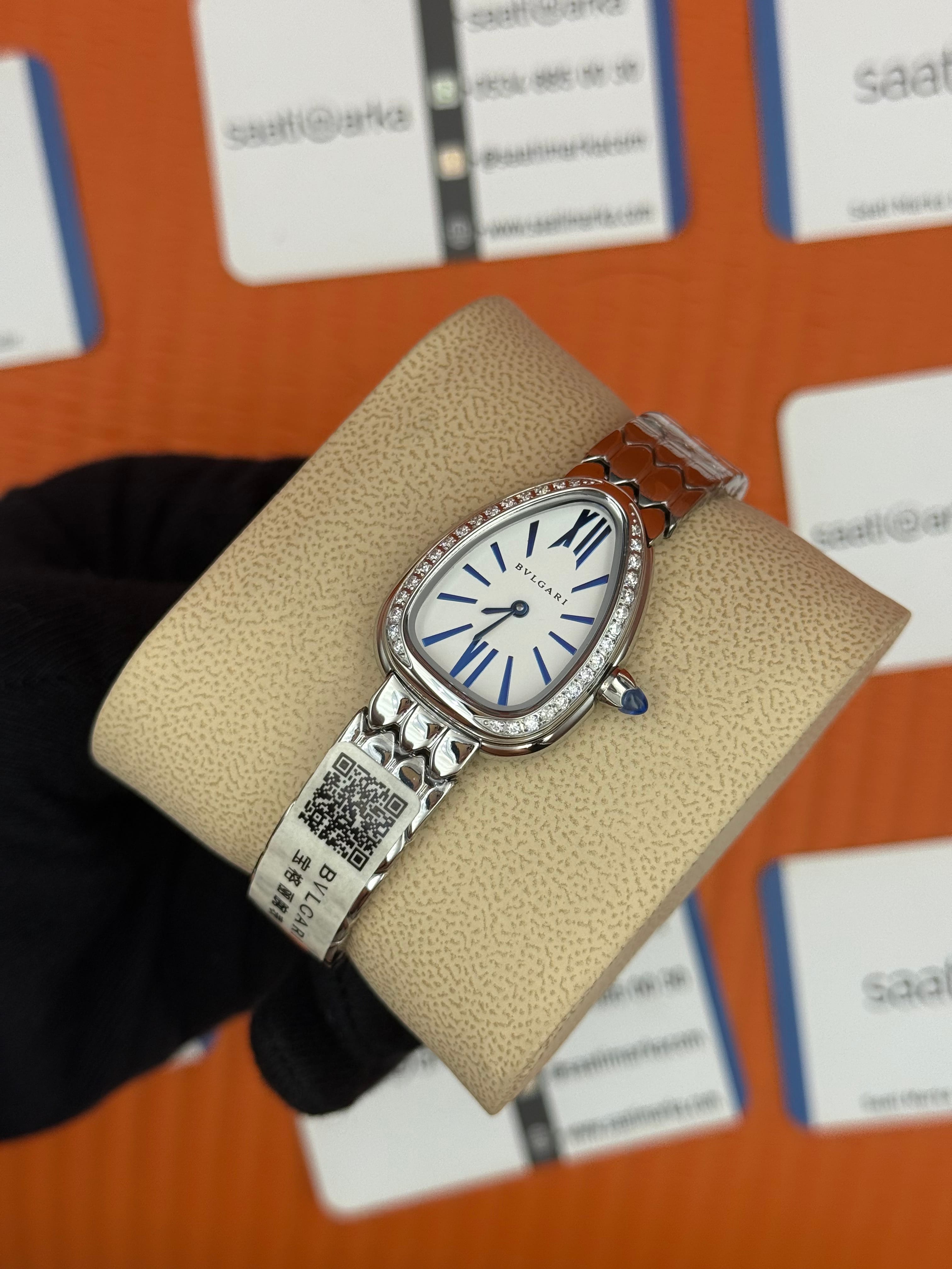 BVLGARİ serpenti seduttori taşlı bezel beyaz kadran silver kasa kordon  kadın kol saati