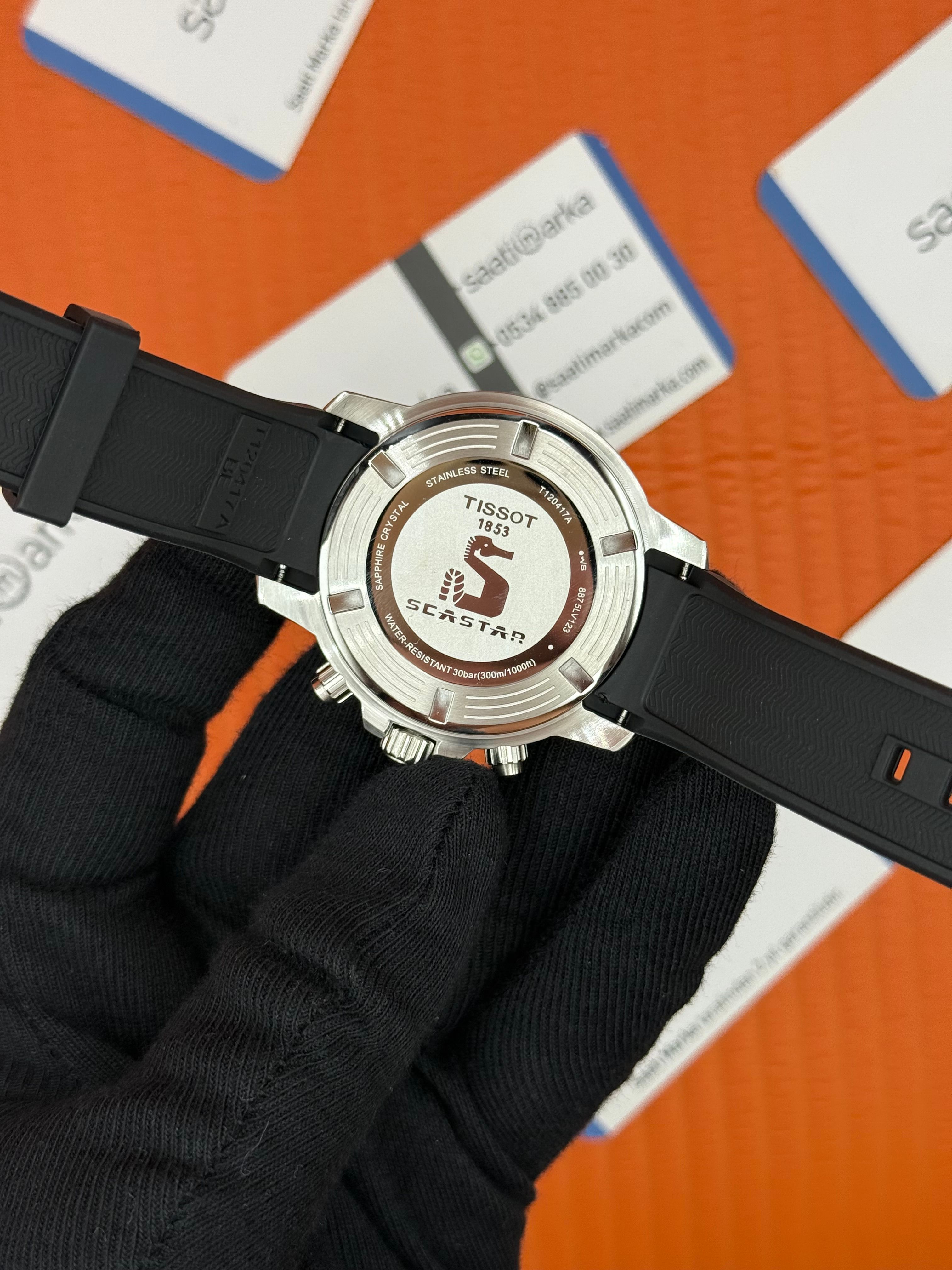 TISSOT siyah kauçuk kordon yeşil kadran silver kasa erkek kol saati