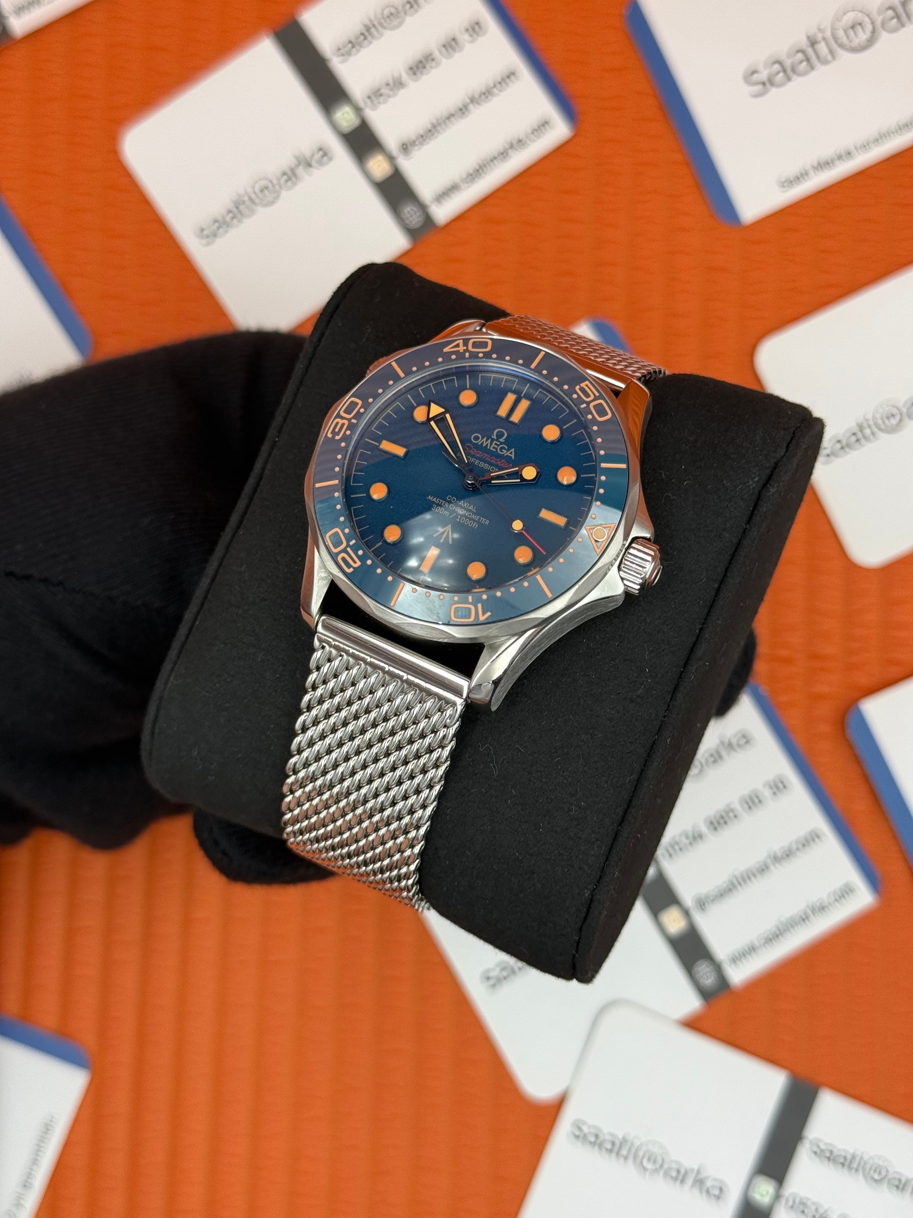 OMEGA JAMES NOND 300M HASIR KORDON ROSE DETAYLI