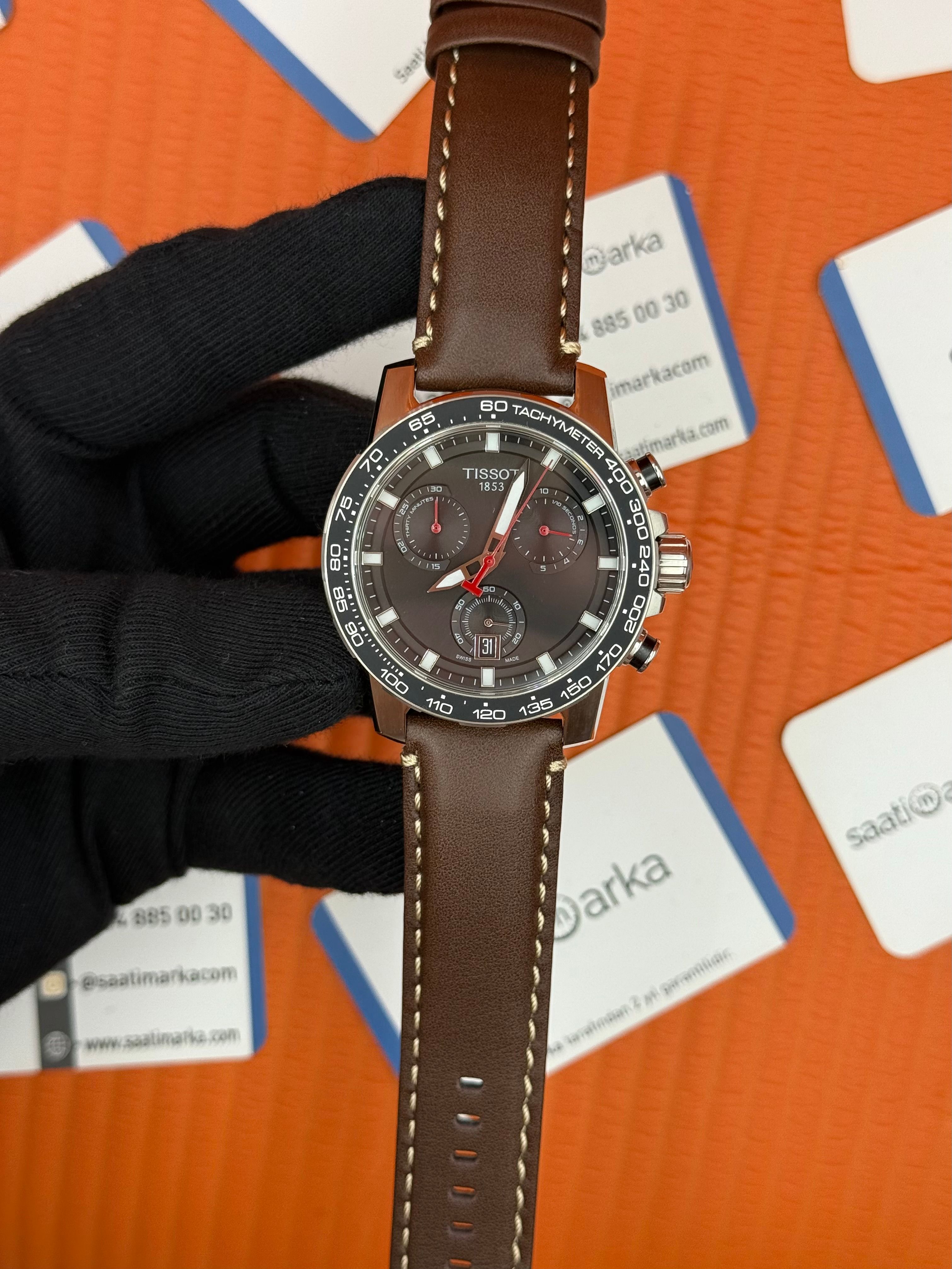 TISSOT kahverengi deri kordon silver kasa siyah kadran erkek kol saati