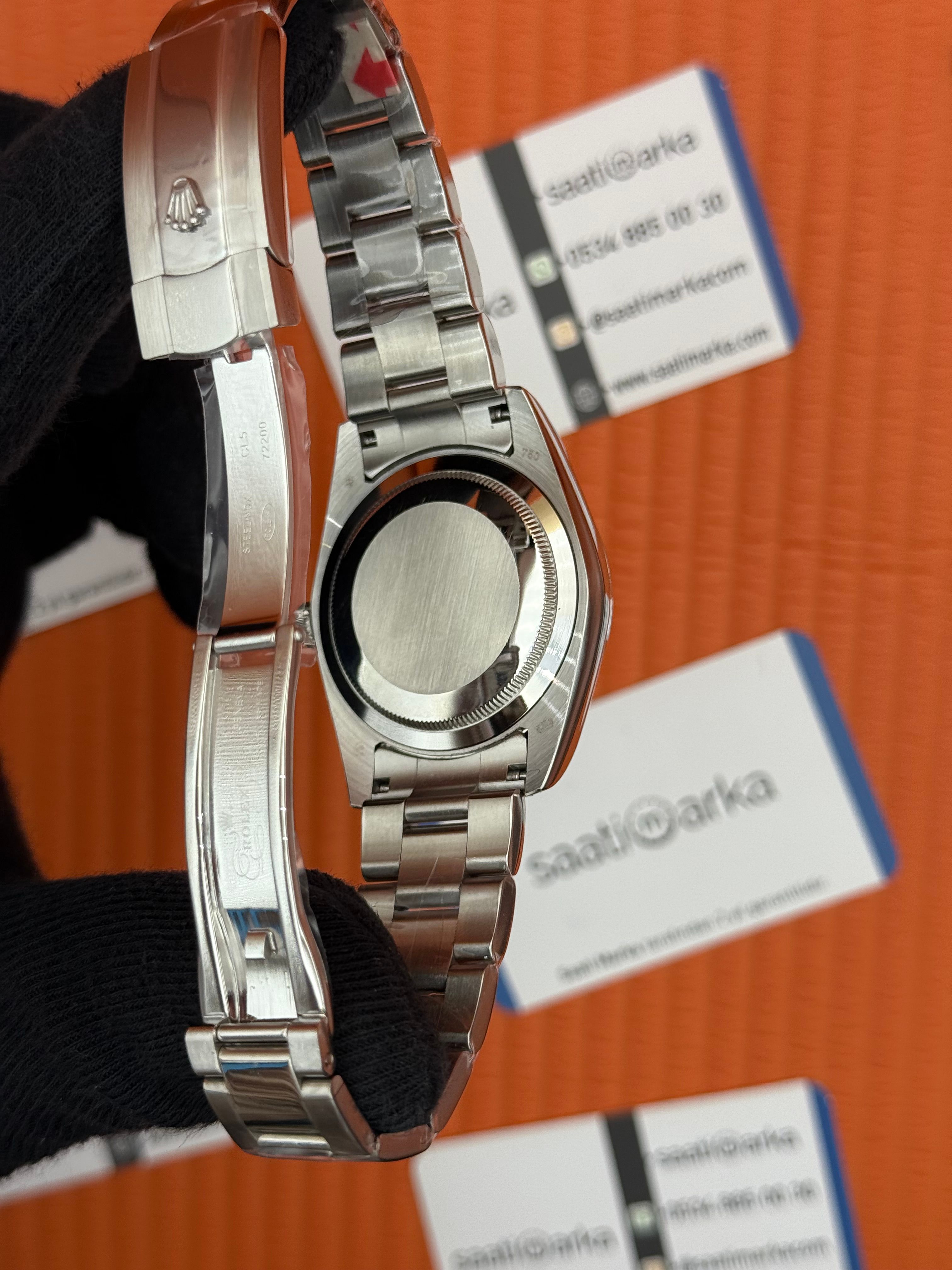 ROLEX Datejust green dial silver oyster kordon