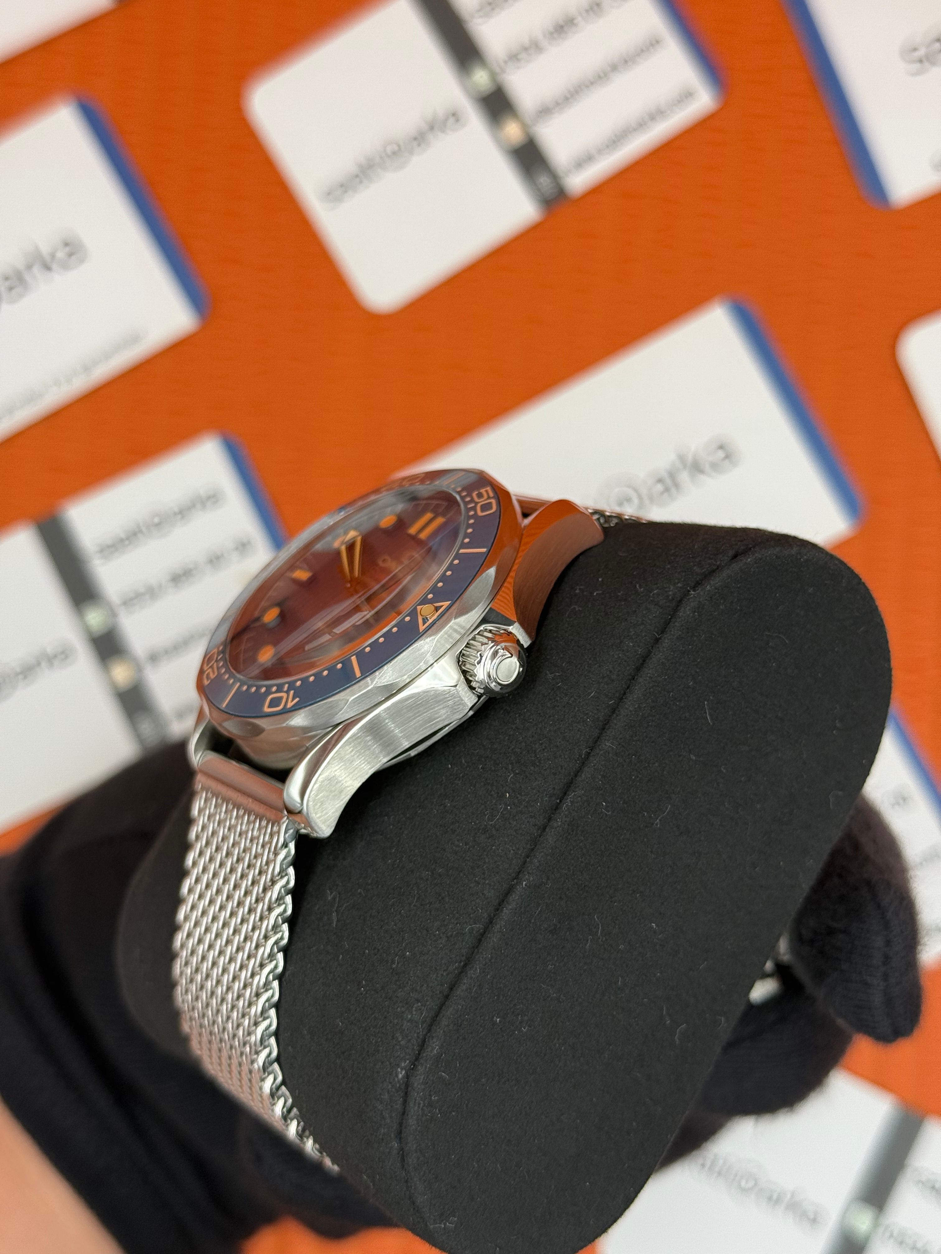 OMEGA JAMES NOND 300M HASIR KORDON ROSE DETAYLI