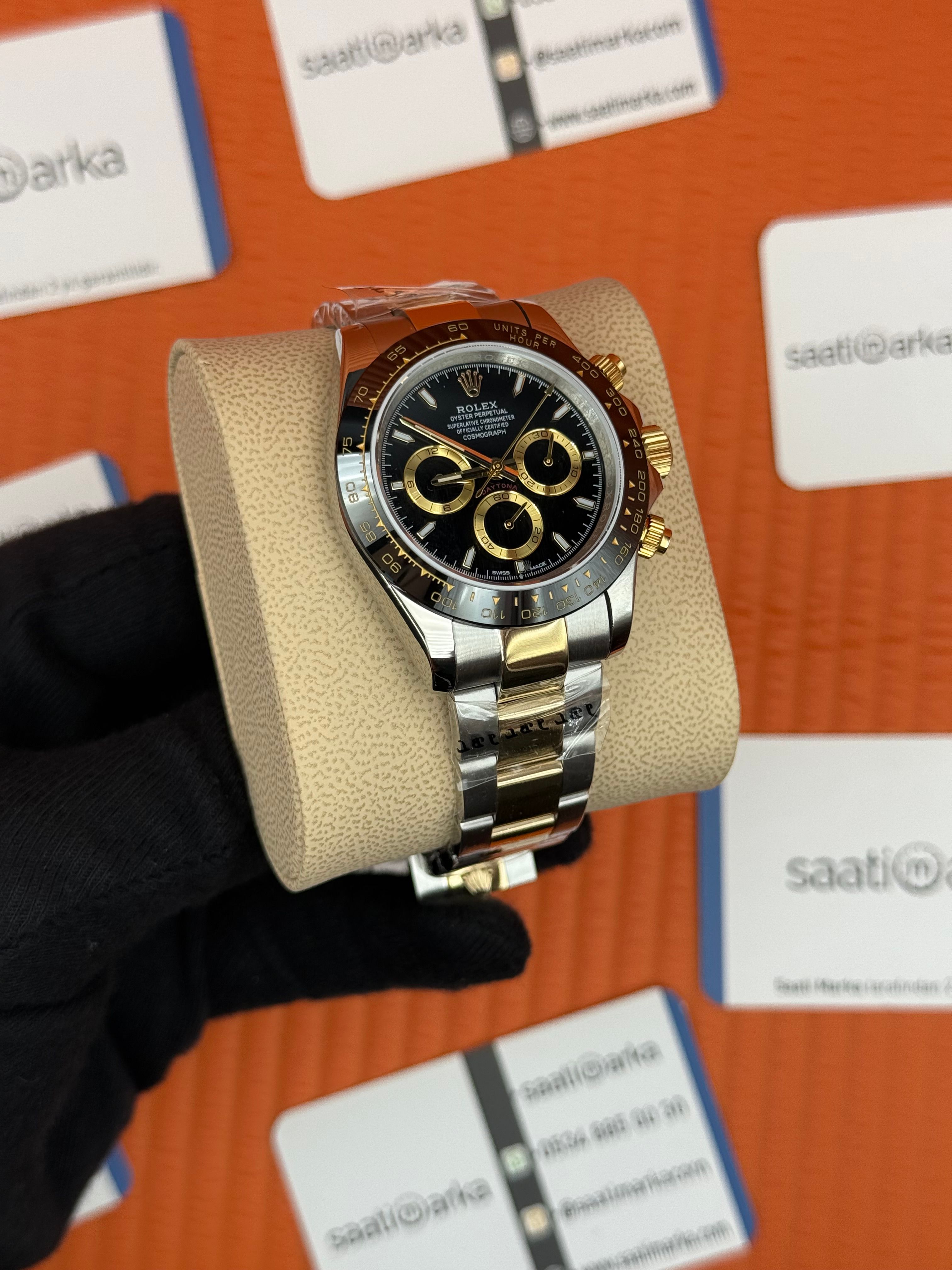 ROLEX Daytona black dial gold silver kasa-kordon